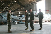 Sgt. Maj. Wayne L. Allen posts for relief by Sgt. Maj. Charles E. Wells as the new sergeant major of Marine Light Attack Helicopter Squadron (HMLA) 167 during a relief and appointment ceremony held in the squadron's hangar aboard Marine Corps Air Station New River, N.C., Feb. 27, 2014.