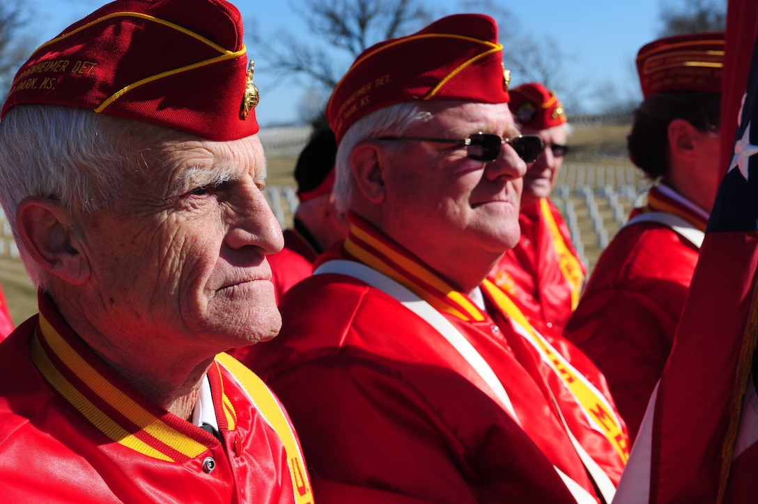 Members with the Marine Corps League stand at the position of attention March 14, at the Iwo Jima Ceremony at Leavenworth National Cemetery before marching in with the colors. Retired Marines, soldiers, sailors and airmen gathered to celebrate the 69th anniversary of the flag raising on Mt. Suribachi  and to honor the fallen and three of the remaining Marines still living.  