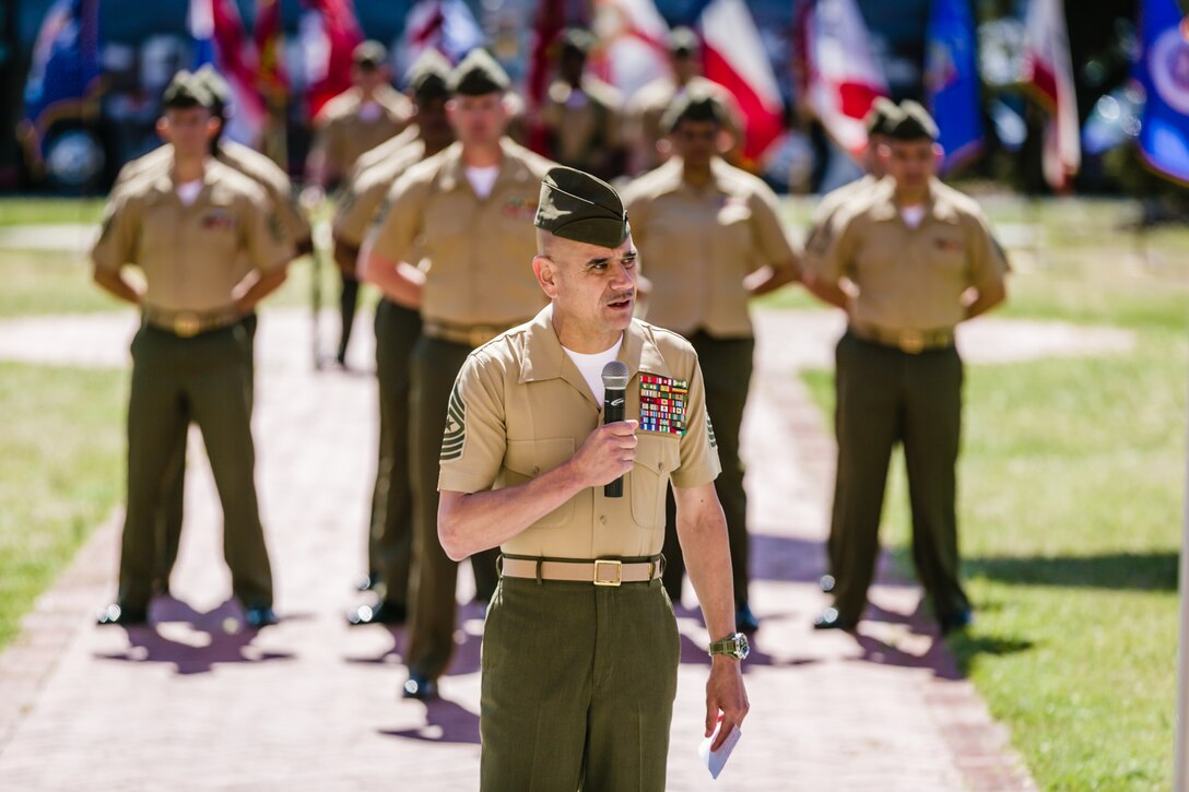 Sgt. Maj. Octaviano Gallegos Jr. bids farewell to the Marines and sailors of the 24th Marine Expeditionary Unit at the relief and appointment ceremony in front of the II Marine Expeditionary Force headquarters aboard Marine Corps Base Camp Lejeune, N.C., March 14. Sgt. Maj. Lanette N. Wright, the first female sergeant major to lead a MEU, assumed the duties from Gallegos as he assumes the duties as sergeant major of the 2nd Marine Expeditionary Brigade.