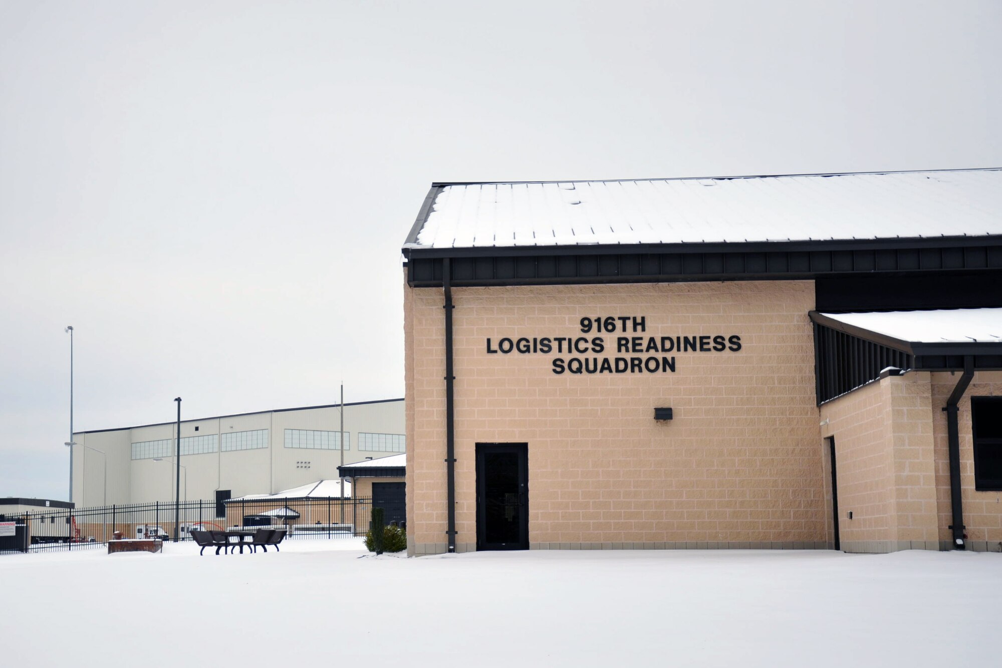 All is still at the 916th Logistics Readiness Squadron on a snowy January day. Base personnel were directed not to report to work several days this winter as icy storms created hazardous driving conditions in the local area. (U.S. Air Force photo by Staff Sgt. Alan Abernethy, 916th ARW/PA) 