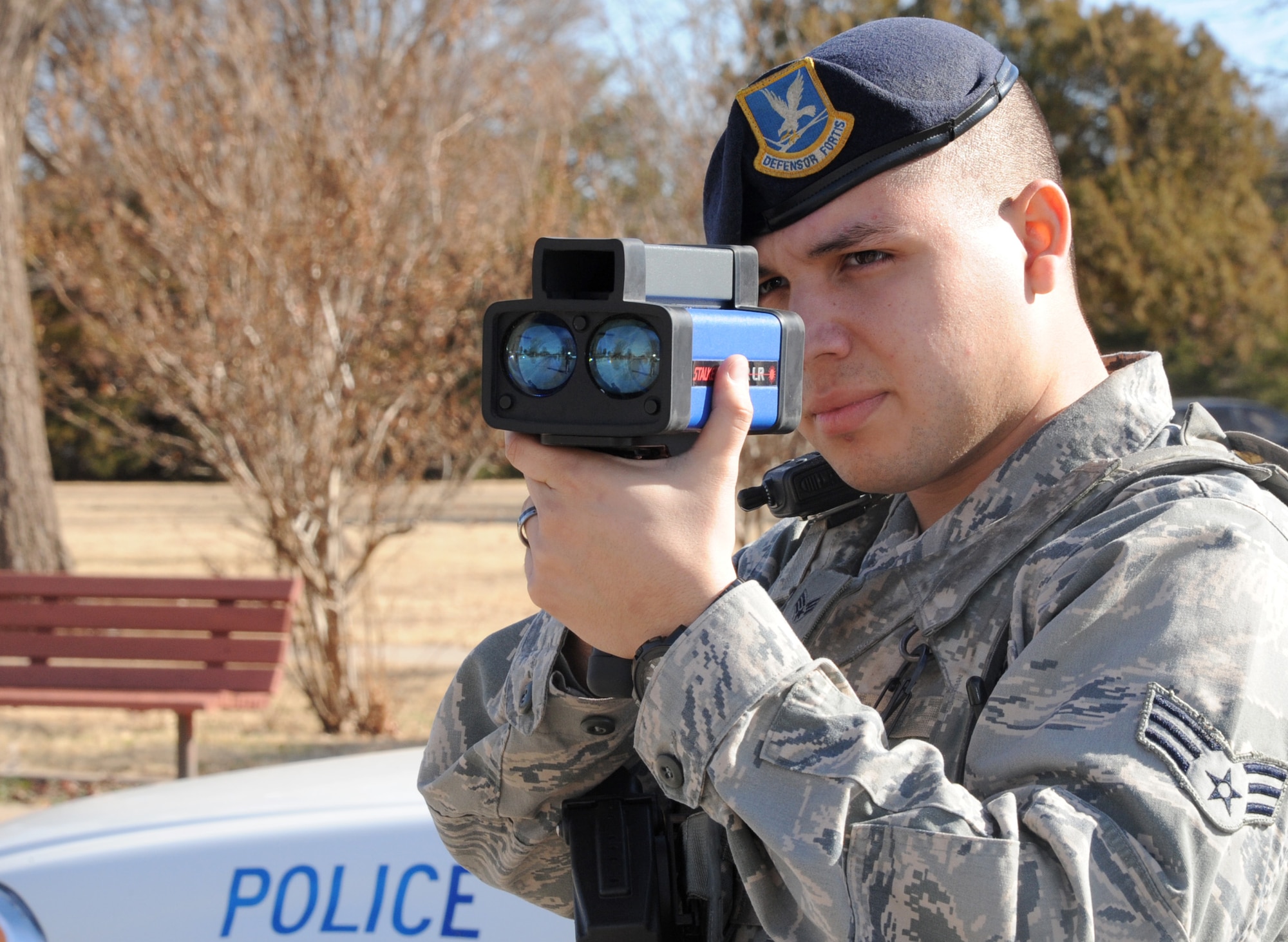 Senior Airman Alex Figueroa, 71st Security Forces Squadron, uses a LIDAR speed gun to monitor drivers on base. (U.S. Air Force photo/ Senior Airman Frank Casciotta)