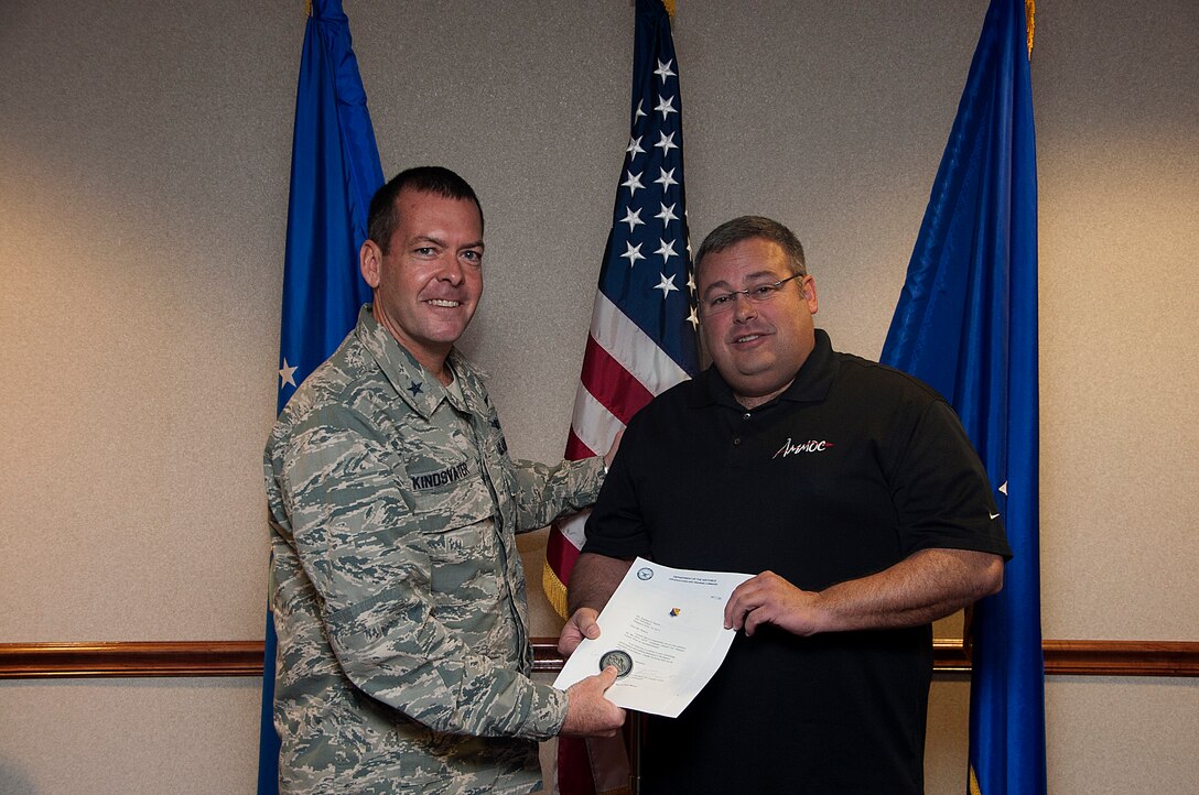Stephen Paxton, a 363rd Training Squadron maintenance instructor, won the Lieutenant General Leo Marquez award at the MAJCOM level.  He was congratulated March 13 by Brig. Gen. Scott Kindsvater, 82nd Training Wing commander. (U.S. Air Force photo by Robert Mcilrath)