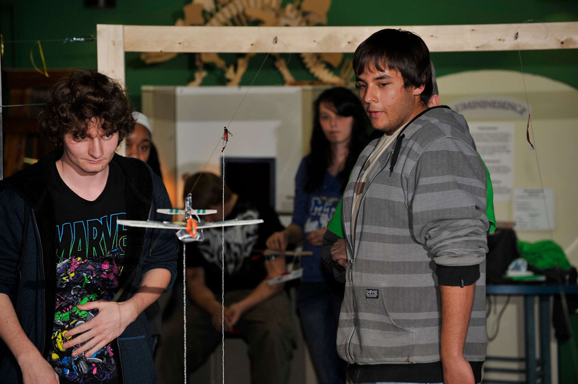 Engineers Week Student Design Competition team members Benjamin Cantrell (left) and Josh Baker (right) from Cascade High School in Bedford County compete their vehicle design against other teams. They were awarded second place at the competition on Feb. 18 at the Hands on Science Center in Tullahoma. (Photo by Rick Goodfriend)