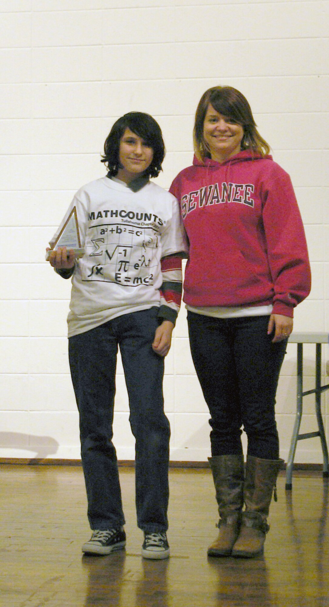 Trey Hippe (left) from Harris Middle School in Shelbyville won the individual second place prize in the MathCounts competition. Hippe is shown here with Harris Middle School’s MathCounts coach Chelsea Philpott. (Photo provided)