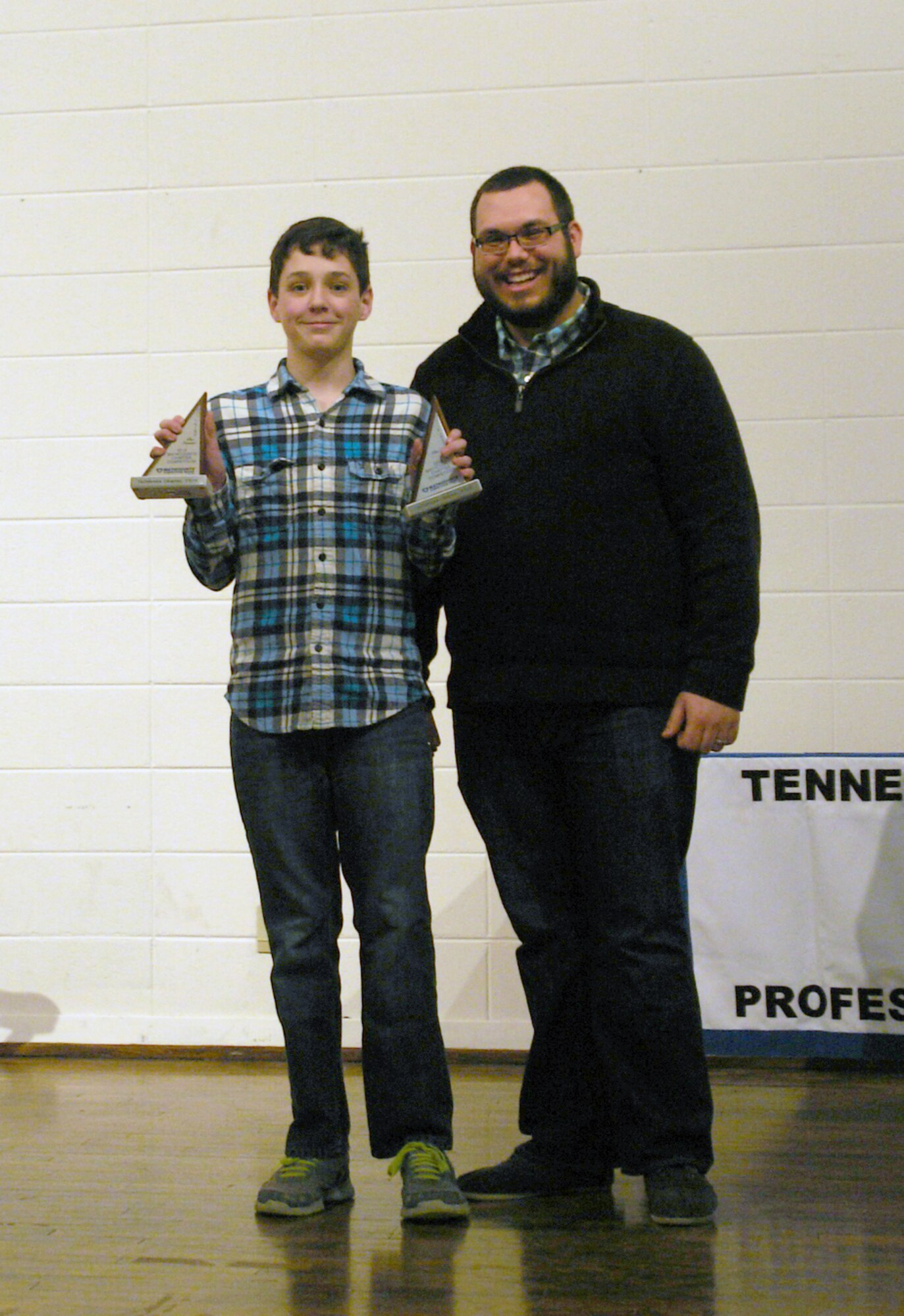 Zane Sharp (left) from West Middle School in Tullahoma won the individual first place prize in the MathCounts competition. He is shown here with his coach Chris King. (Photo provided)