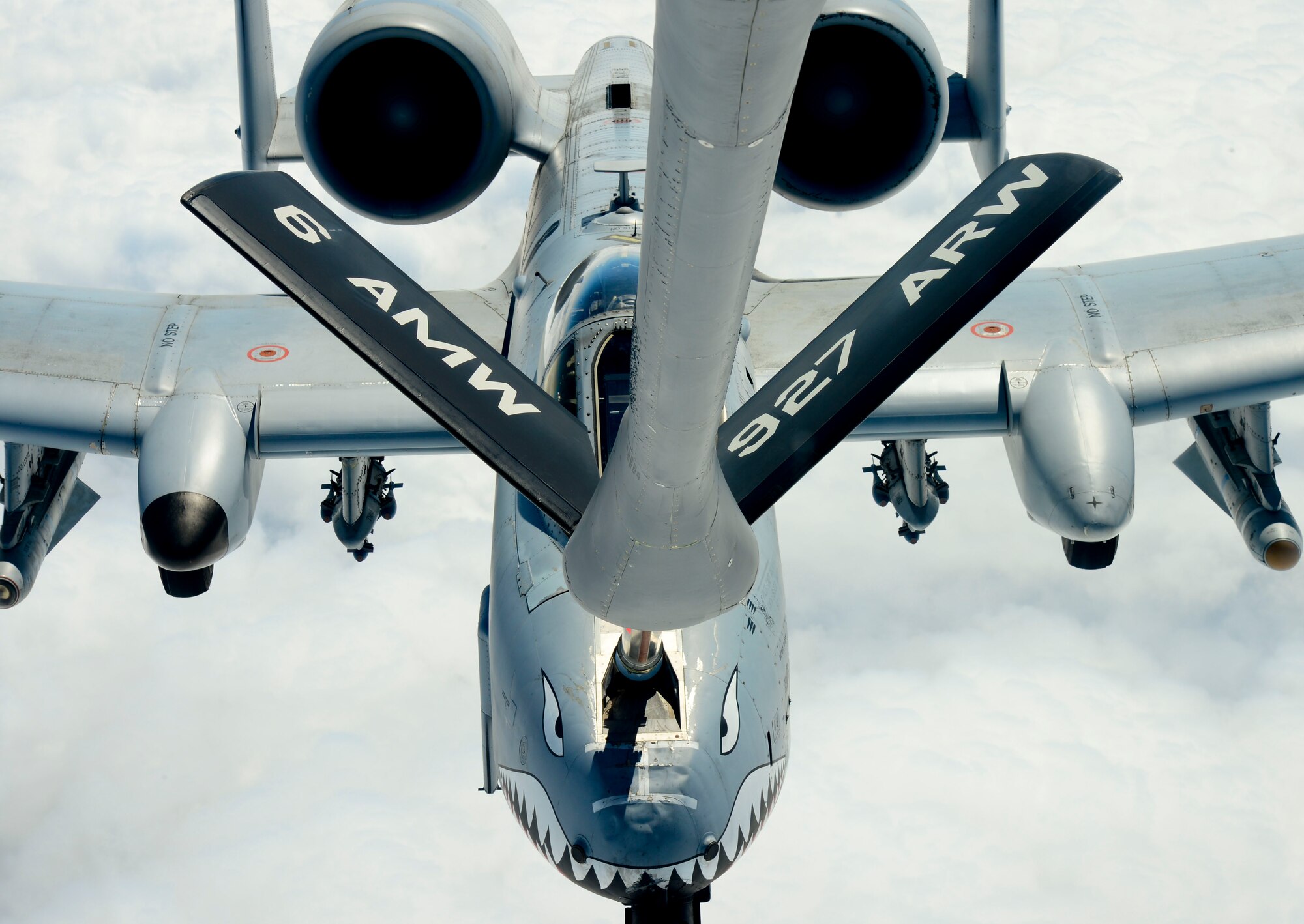 An A-10 Thunderbolt simulates in-flight refueling during a media operations flight March 12, 2014 over Moody Air Force Base, Ga. During the flight, a KC-135 Stratotanker conducted a simulated in-flight refueling training mission with six A-10s. (U.S. Air Force photo by Senior Airman Jenay Randolph/Released)