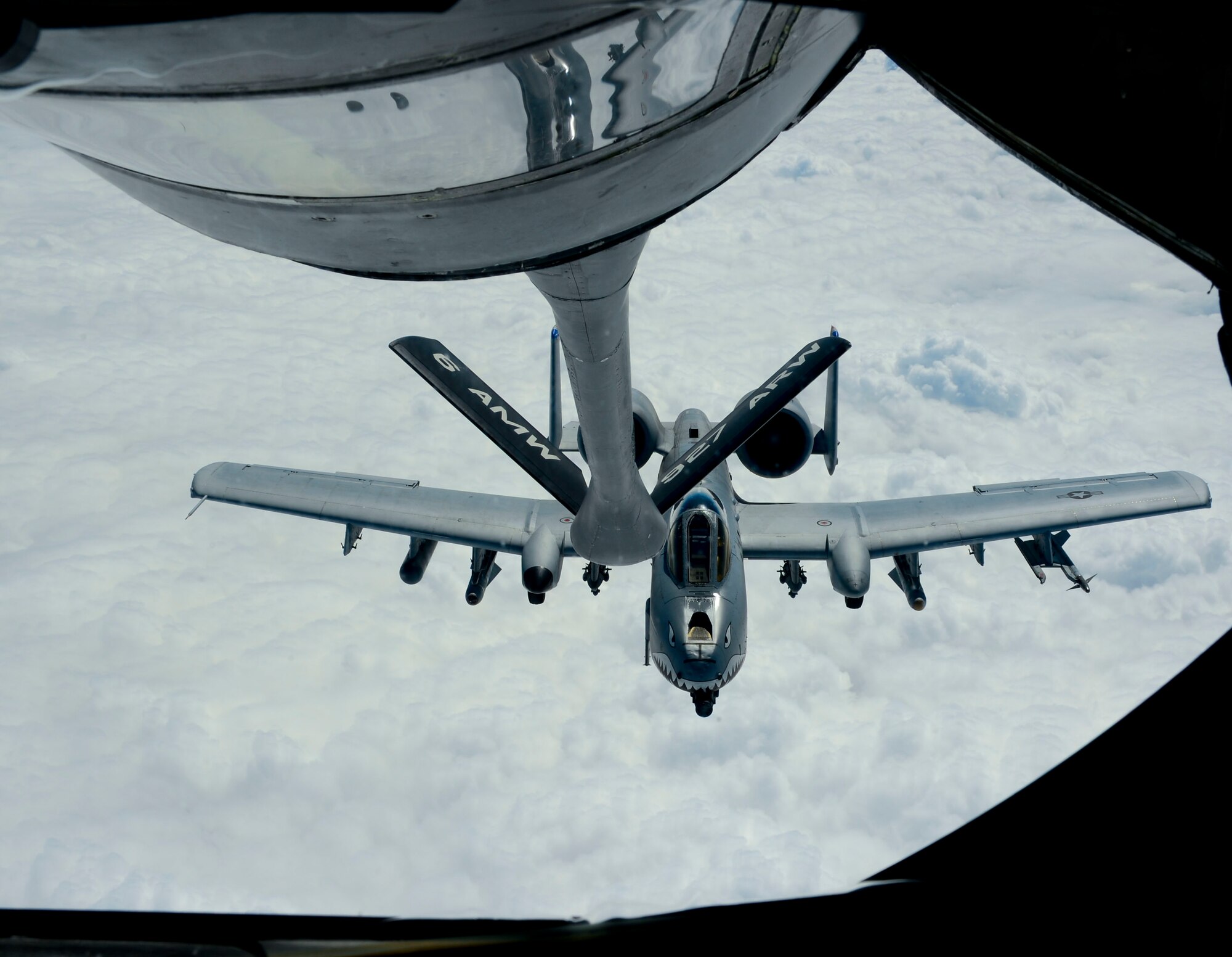 An A-10 Thunderbolt simulates in-flight refueling during a media operations flight March 12, 2014 over Moody Air Force Base, Ga. During the flight, a KC-135 Stratotanker conducted a simulated in-flight refueling training mission with six A-10s. (U.S. Air Force photo by Senior Airman Jenay Randolph/Released)