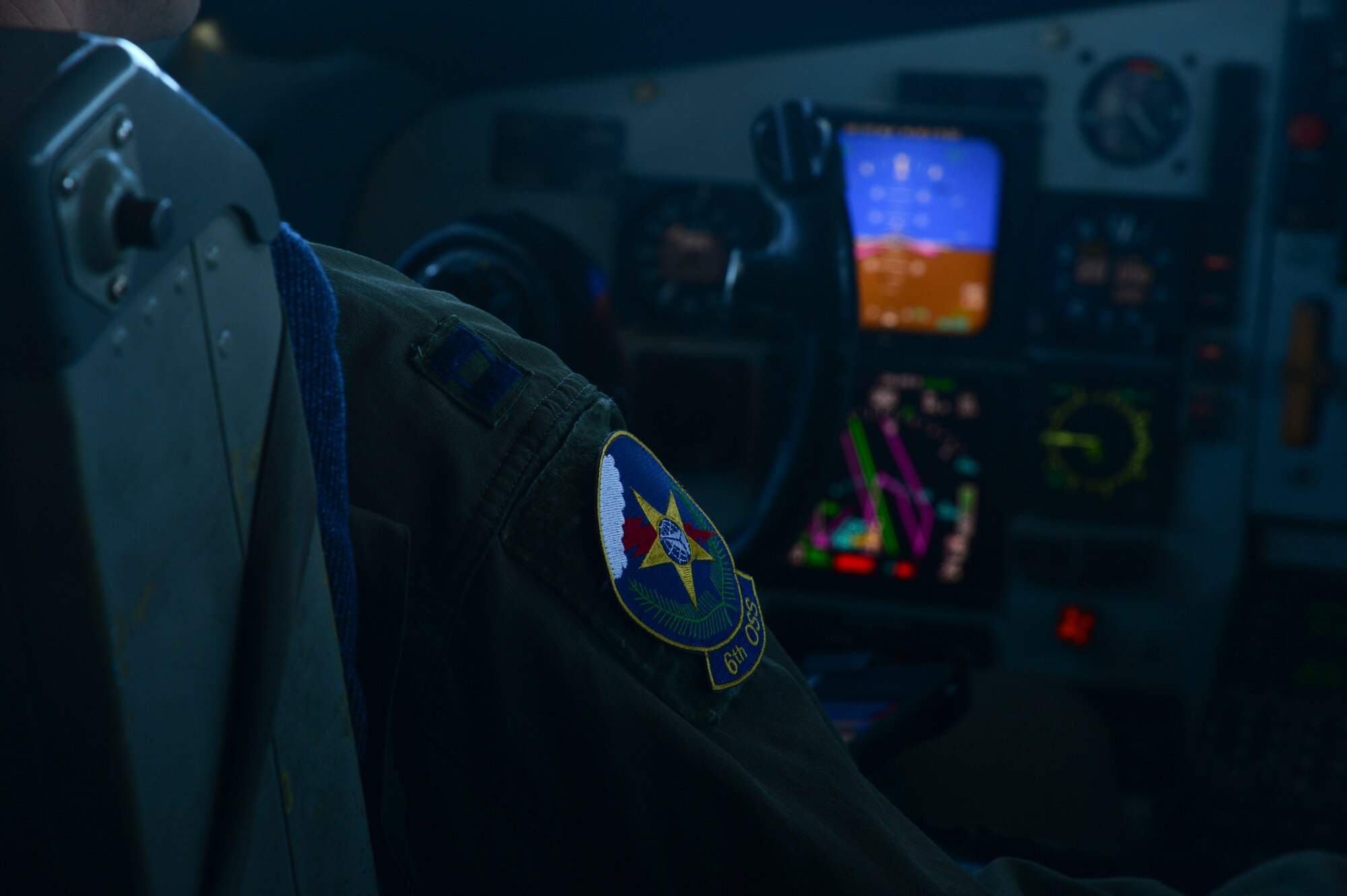 Capt. Matthew Swee, 6th Operations Support Squadron pilot, performs pre-flight checks March 12, 2014 at MacDill Air Force Base, Fla. The crew allowed the aircraft to soar 20,000 feet above the ground at speeds of about 230 mph. (U.S. Air Force photo by Senior Airman Jenay Randolph/Released)