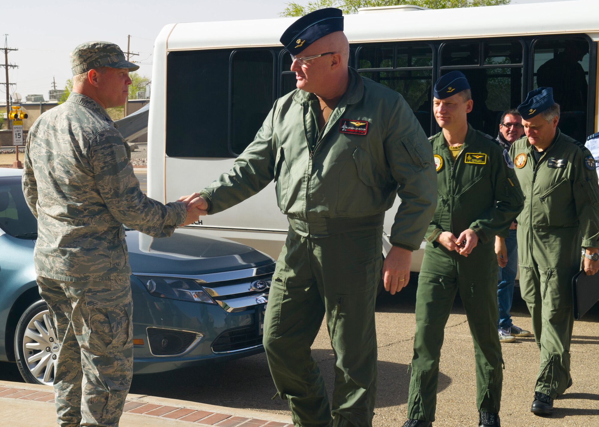 Colonel Andrew Croft, 49th Wing commander greets Lt. Gen. Alexander Schnitger Royal Netherland Air Force commander and accompanying visitors arrive at Holloman Air Force Base, N.M., March 12. The Royal Netherland Air Force visited Holloman to better understand the MQ-9 Reaper’s operations, training and logistics requirements. (U.S. Air Force photo by Airman 1st Class Leah Ferrante/Released)
