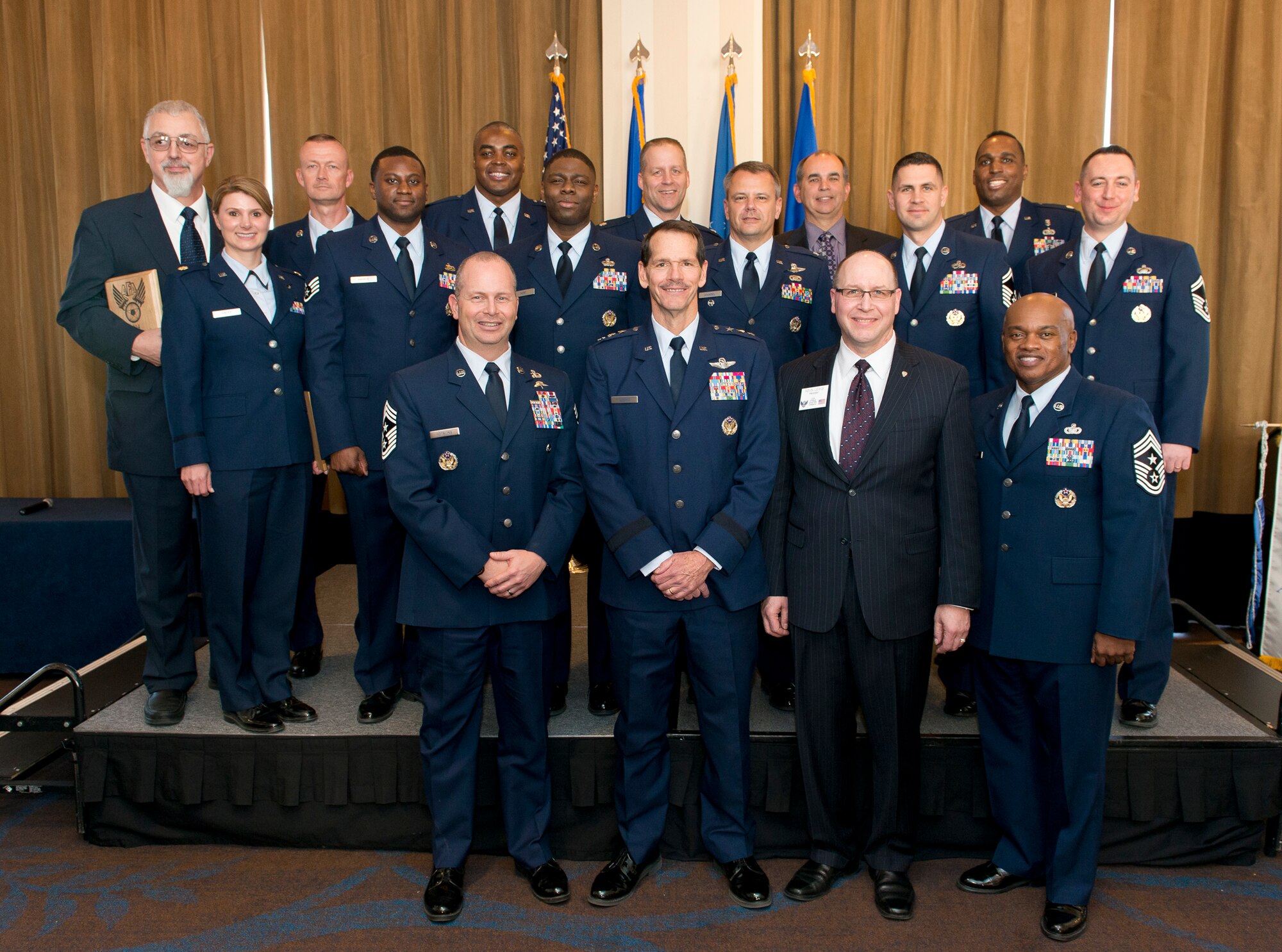 The Air Force Association's D.W. Steel Sr. Memorial Chapter hosts the 12th Annual AFA Salute to the Air National Guard along with Lt. Gen. Stanley E. Clarke III, director of the Air National Guard, recognize members assigned to the National Guard Bureau during a ceremony March 13, 2014, at the Sheraton Pentagon City Hotel in Arlington, Va. The AFA is a non-profit, independent, professional military and aerospace education association that promotes a dominant Air Force and a strong national defense, and honors Airmen and Air Force heritage. (U.S. Air National Guard photo by Master Sgt. Marvin R. Preston/RELEASED)