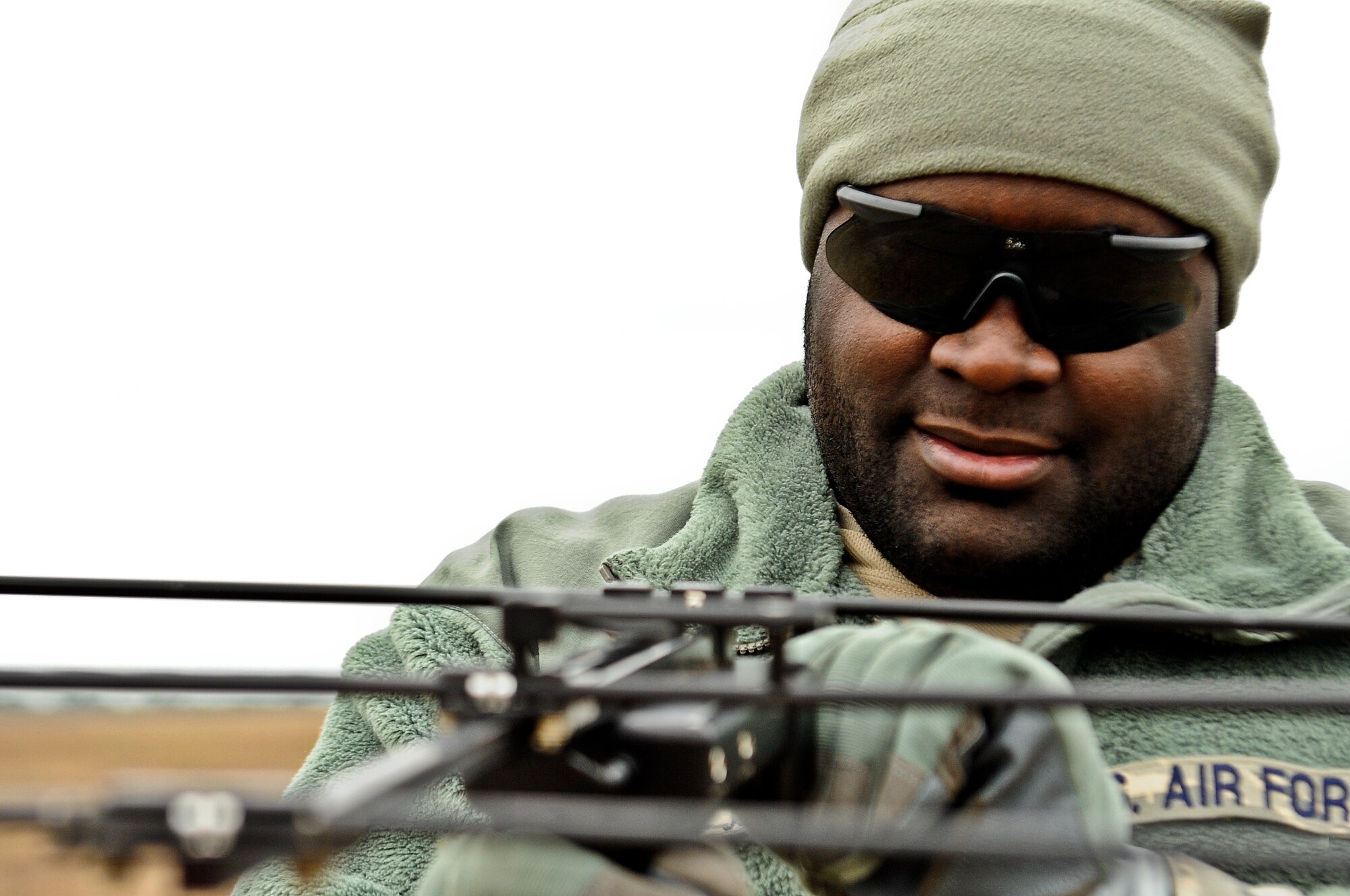 Staff Sgt. Jonathan Carter, 1st Special Operations Security Forces Squadron desk sergeant, uses a "Falcon Finder" at Choctaw Field, Fla., March 4, 2014. The device used GPS to help locate a small unmanned aerial system in a forested section. (U.S. Air Force photo/Senior Airman Michelle Patten)

