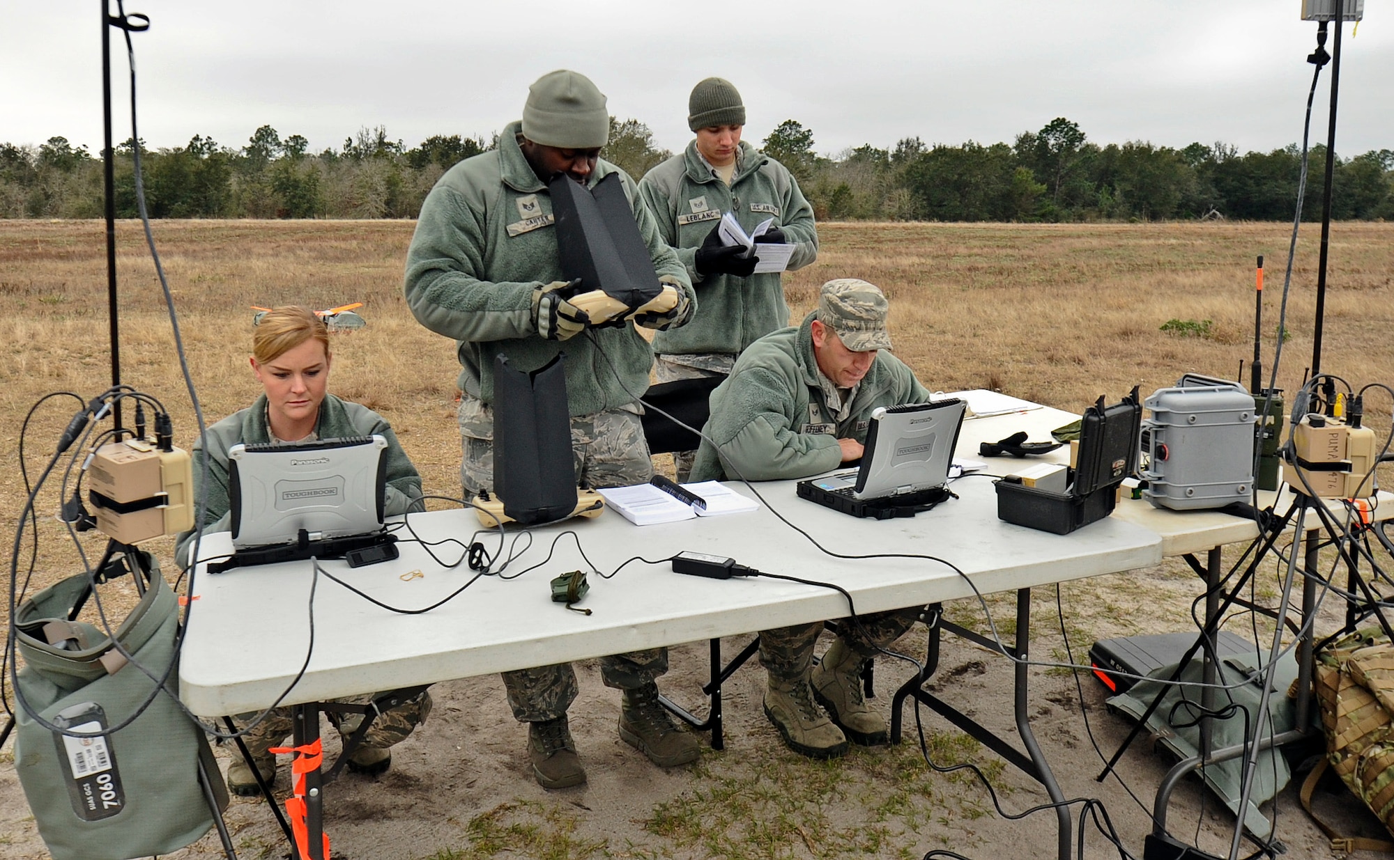 A team from the 1st Special Operations Security Forces Squadron conducts small unmanned aerial system training at Choctaw Field, Fla., March 4, 2014. The Airmen trained on launches, navigational procedures and landings during their live flights. (U.S. Air Force photo/Senior Airman Michelle Patten)


