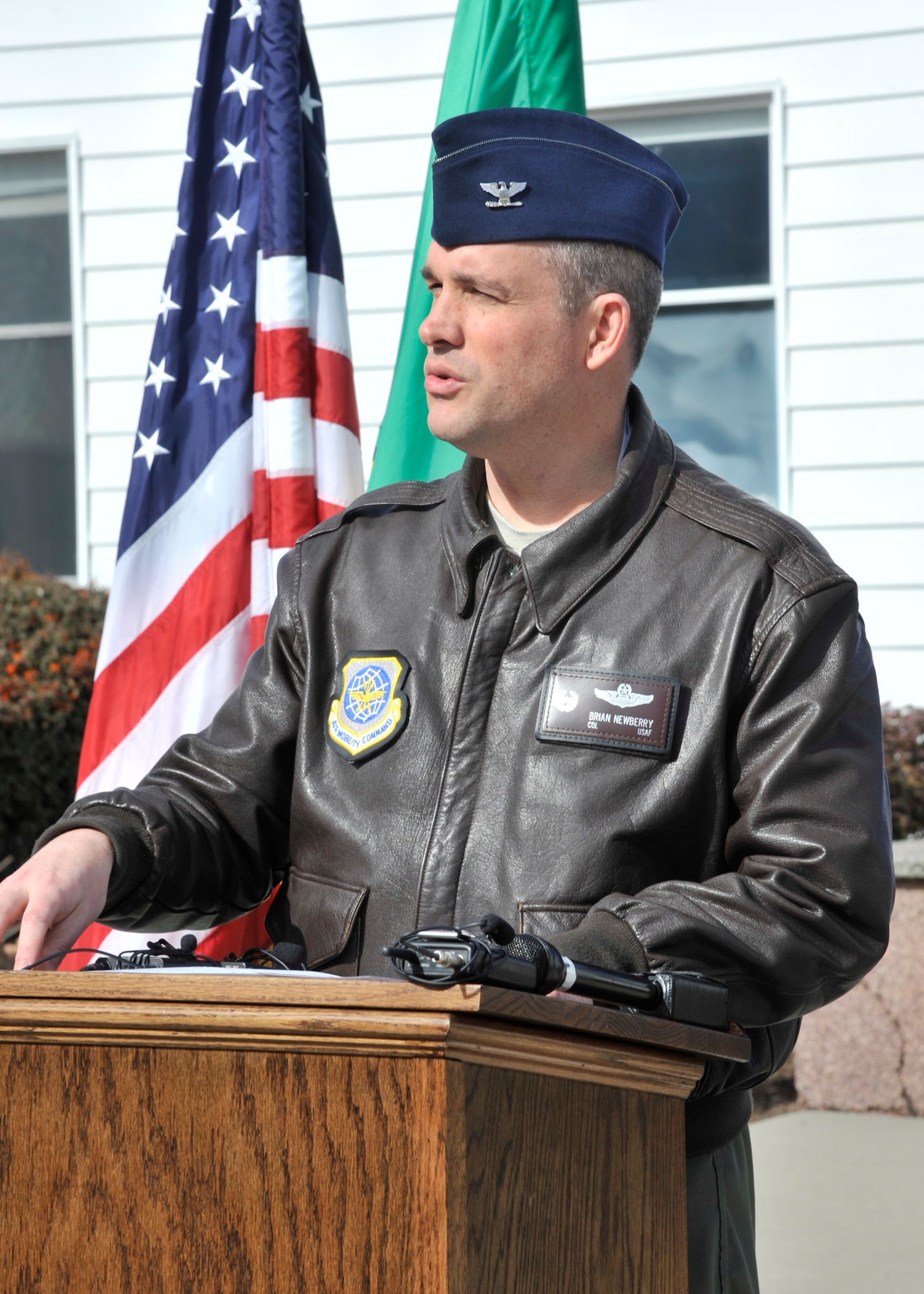 Col. Brian Newberry, 92nd Air Refueling Wing commander, speaks during a press conference following the release of the results of the accident investigation board that examined what caused the May 3, 2013, crash of a KC-135 in the Kyrgyz Republic, at Fairchild Air Force Base, Wash., March 13, 2014. The aircraft was assigned to the 22nd ARW at McConnell Air Force Base, Kan., and was flown by members of the 92nd ARW. The crew and aircraft were flying out of the 376th Air Expeditionary Wing at the Transit Center Manas. (U.S. Air Force photo by Senior Airman Mary O'Dell/Released)