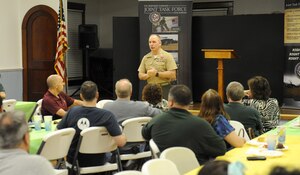 U.S. Marine Corps Col. David Olszowy, Joint Task Force Civil Support deputy commander, explains the mission and purpose of JTF-CS to the Chesapeake Emergency Response Team (CERT) during a visit to Chesapeake, Va., March 10, 2014. Olszowy discussed the capabilities that can be employed during a chemical, biological, radiological, nuclear (CBRN) disaster response in the United States. The CERT educates the community about disaster preparedness for hazards that may impact their area and trains in basic disaster response skills. JTF-CS anticipates, plans and prepares for CBRN-Defense Support of Civil Authorities (CBRN-DSCA) response operations. (DOD photo by U.S. Navy Petty Officer 1st Class Brian Dietrick/Released)

