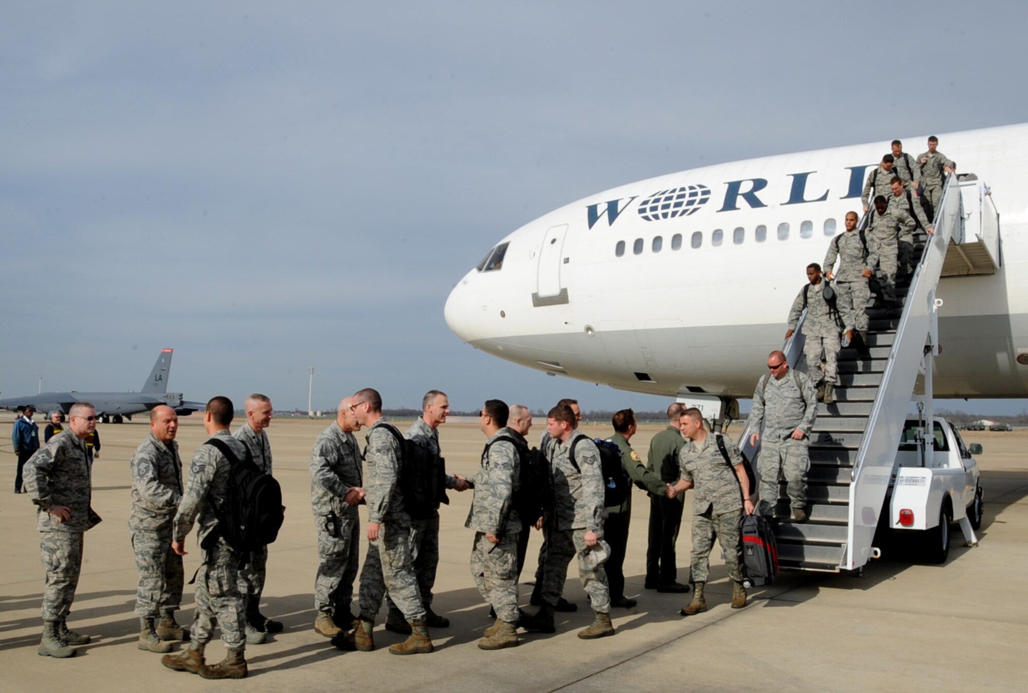 Wing leadership greet Airmen on Barksdale Air Force Base, March 7, 2014 after returning from a six month deployment to Andersen Air Force Base, Guam, in support of the Continuous Bomber Presence. (U.S. Air Force photo/Staff Sgt. Sean Martin)
