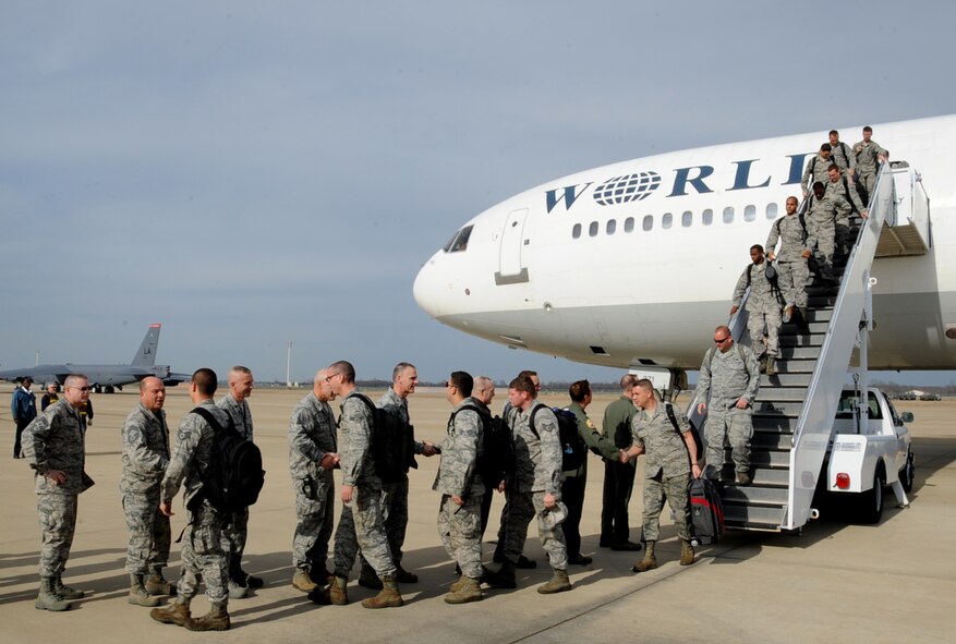 Wing leadership greet Airmen on Barksdale Air Force Base, March 7, 2014 after returning from a six month deployment to Andersen Air Force Base, Guam, in support of the Continuous Bomber Presence. (U.S. Air Force photo/Staff Sgt. Sean Martin)