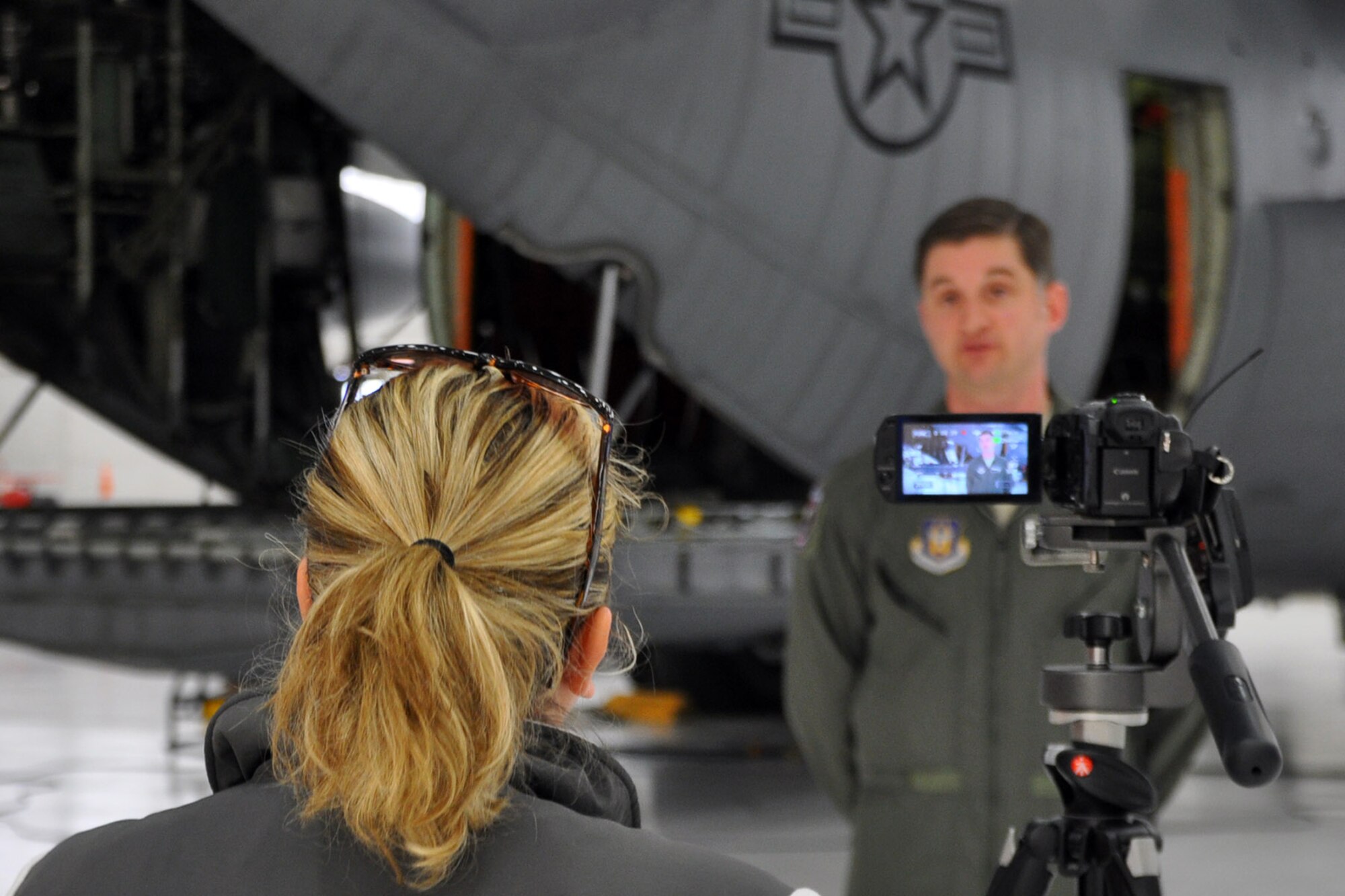 YOUNGSTOWN AIR RESERVE STATION, Ohio – Air Force Reserve Maj. Jay Ference, 910th Operations Group Unit Deployment Manager and YARS air show coordinator, gives an interview to a member of the Youngstown-Warren Regional Chamber of Commerce’s Take 5 media team in a maintenance hangar here, March 10, 2014. Ference and Ms. Holly Baker, a member of the Youngstown Air Reserve Base-Community Council’s air show planning committee, were interviewed regarding the upcoming YARS Thunder Over The Valley 2014 Air Show and Open House, scheduled here for May 17-18, 2014. U.S. Air Force photo by Master Sgt. Bob Barko Jr.