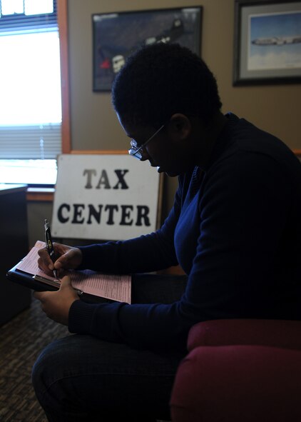 Airman 1st Class Maya Sivak, 341st Missile Security Forces Squadron member, fills out an interview sheet at the Malmstrom Air Force Base Tax Center before filing her first return as an Airman in the U.S. Air Force. The center is available to active-duty Airmen, their dependents and retirees. (U.S. Air Force photo/Senior Airman Katrina Heikkinen)