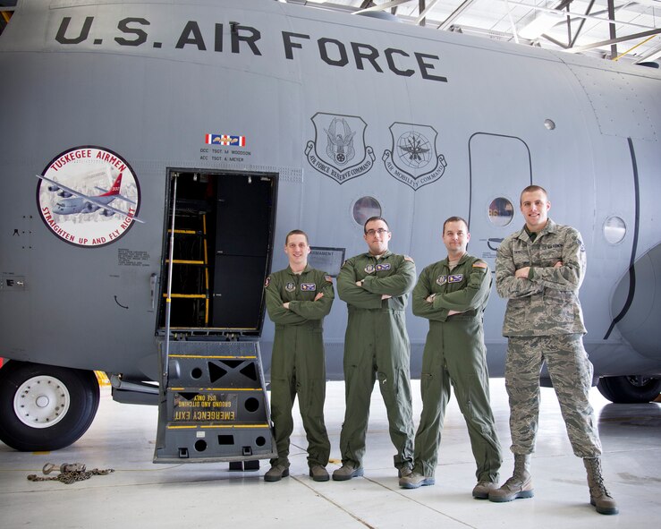 From left to right, Tech. Sgt. Justin Gort, Staff Sgt. Max Gillmer, Tech. Sgt. Ryan Christopherson, and Staff Sgt. Dan Tate, 96th Airlift Squadron, are in training to become pilots.  The four were selected at different times, but are all becoming officer trainees together in class 14-05.  (U.S. Air Force photo/Shannon McKay/Released)