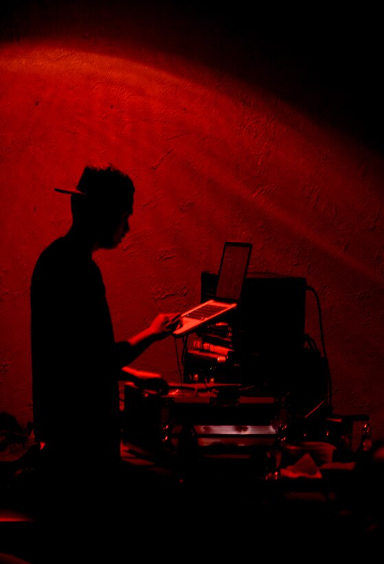 Senior Airman Vincent Palafox, 28th Aircraft Maintenance Squadron aircraft electrical and environmental systems technician, mixes and plays back recorded music during Open Mic Night at the Dakota’s Club at Ellsworth Air Force Base, S.D., March 7, 2014. This is the fourth Open Mic Night Ellsworth has hosted that allowed participants to showcase their talents. (U.S. Air Force photo by Airman 1st Class Rebecca Imwalle/ Released)