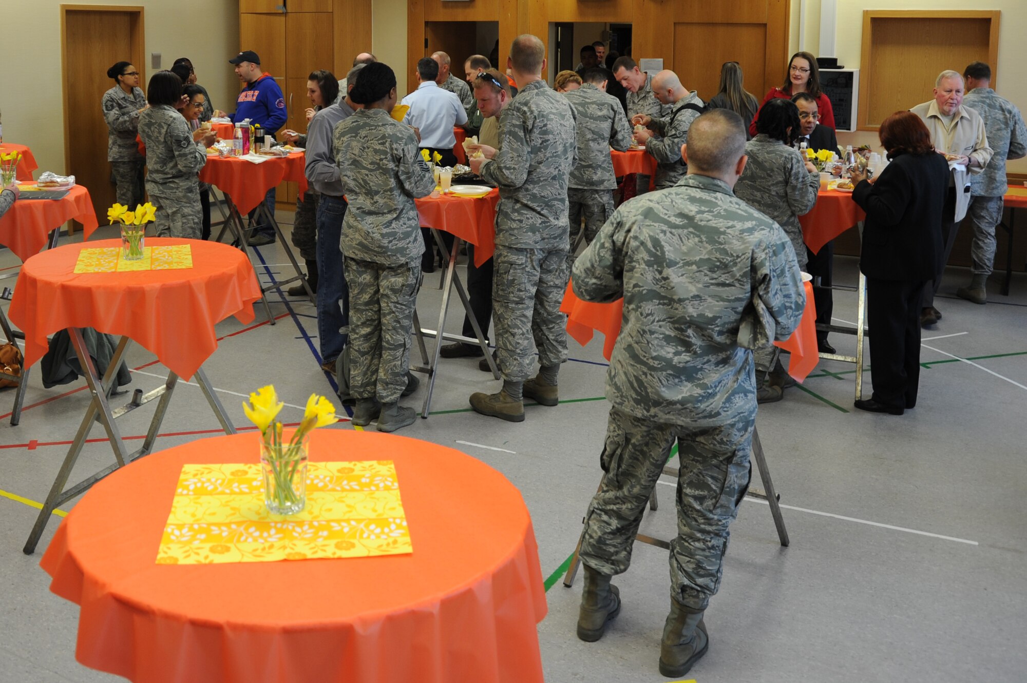Spangdahlem community members have breakfast during the Spangdahlem National Prayer Breakfast March 14, 2014, in the base chapel at Spangdahlem Air Base, Germany. The annual event originally started in 1953 as the Presidential Prayer Breakfast before organizers changed the name to the National Prayer Breakfast in 1970. (U.S. Air Force photo by Airman 1st Class Dylan Nuckolls/Released)