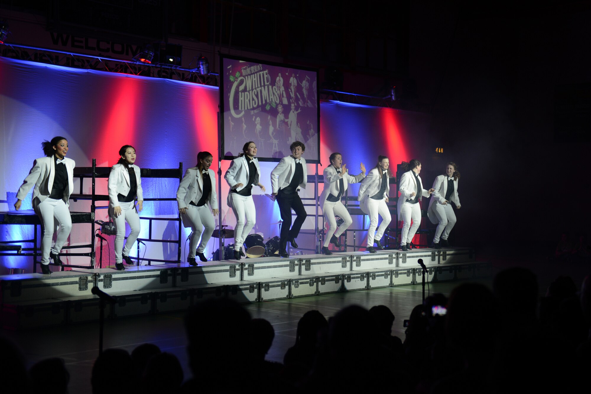 The Young Americans tap dance during their performance at RAF Alconbury Middle/High School March 1. The performance capped a two-day workshop where elementary, middle and high school students from RAF Alconbury learned about music and dance. (U.S. Air Force photo by Tech. Sgt. Chrissy Best)