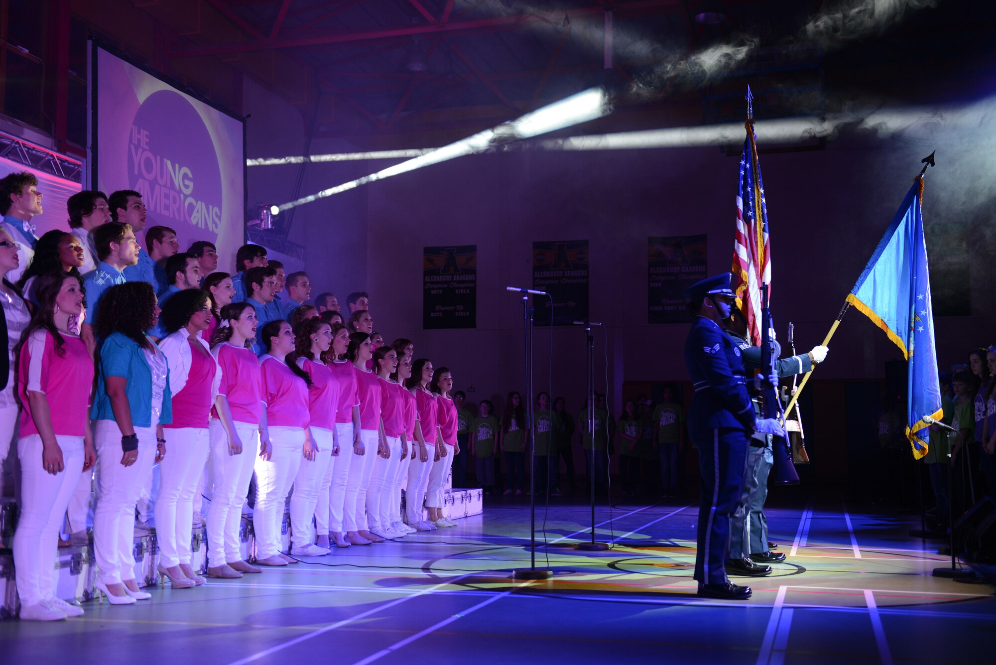 The RAF Alconbury Honor Guard present the colors at the start of a performance by The Young Americans and more than 170 students from Alconbury Elementary School and Alconbury Middle/High School, March 1. (U.S. Air Force photo by Tech. Sgt. Chrissy Best)