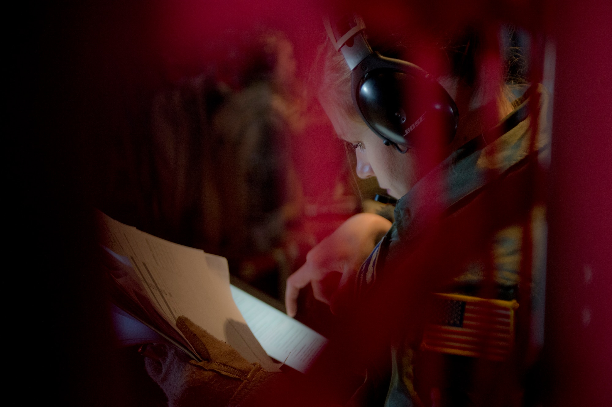 Staff Sgt. Danika Fulham, 86th Aeromedical Evacuation Squadron aeromedical evacuation technician, reviews a checklist inside a C-130J Super Hercules during a training opportunity that measured the crew’s capabilities to handle in-flight scenarios March 6, 2014, Ramstein Air Base, Germany. The 86th AES is responsible for providing aeromedical evacuation for U.S. troops throughout U.S. Air Forces in Europe and Air Forces Africa’s area of responsibility. (U.S. Air Force photo/Airman 1st Class Jordan Castelan)