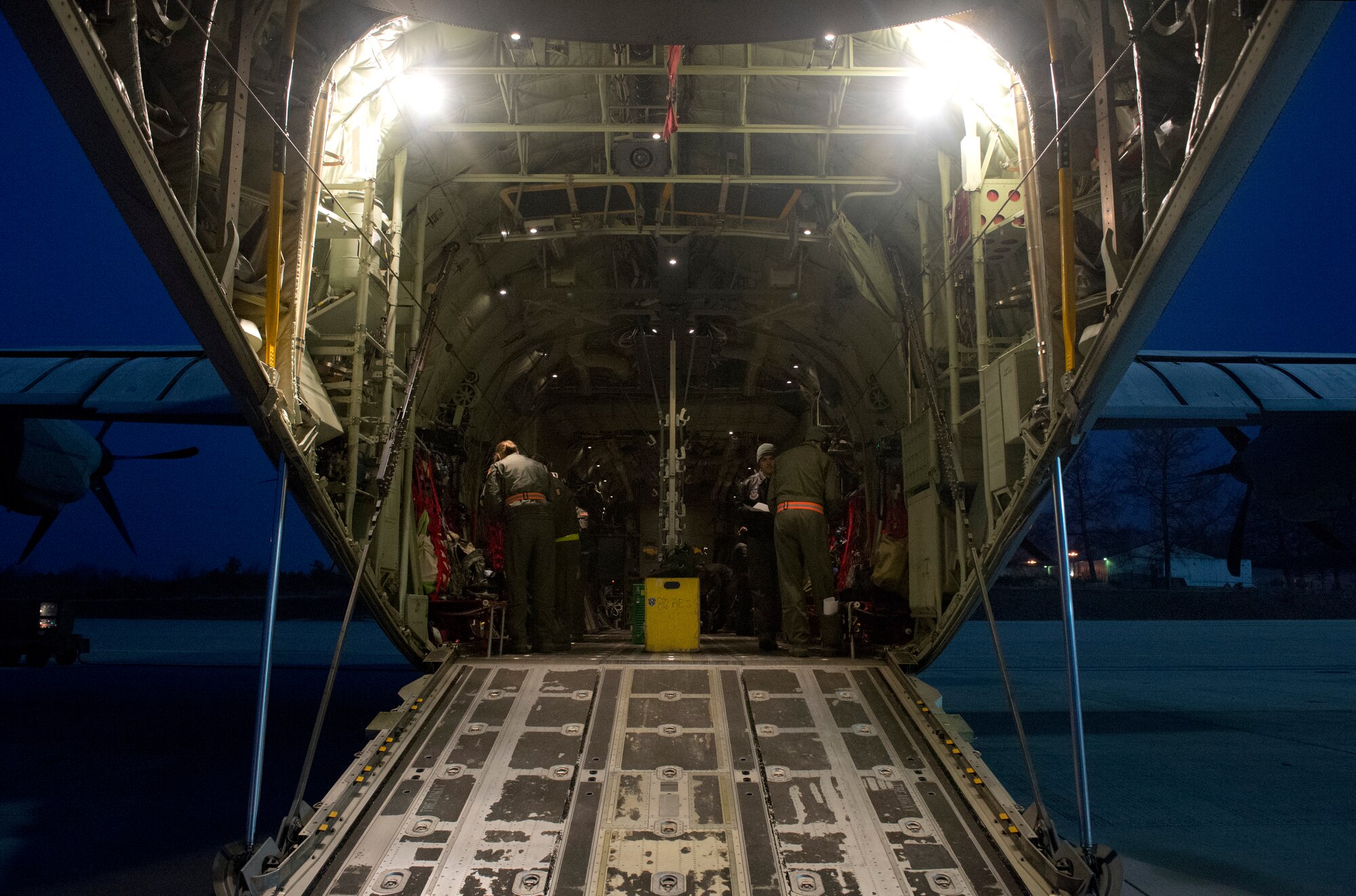 Flight nurses and aeromedical evacuation technicians with the 86th Aeromedical Evacuation Squadron prepare a C-130J Super Hercules during a training opportunity that measured the crew’s capabilities to handle in-flight scenarios March 6, 2014, Ramstein Air Base, Germany. The 86th AES is responsible for providing aeromedical evacuation for U.S. troops throughout U.S. Air Forces in Europe and Air Forces Africa’s area of responsibility. (U.S. Air Force photo/Airman 1st Class Jordan Castelan)
