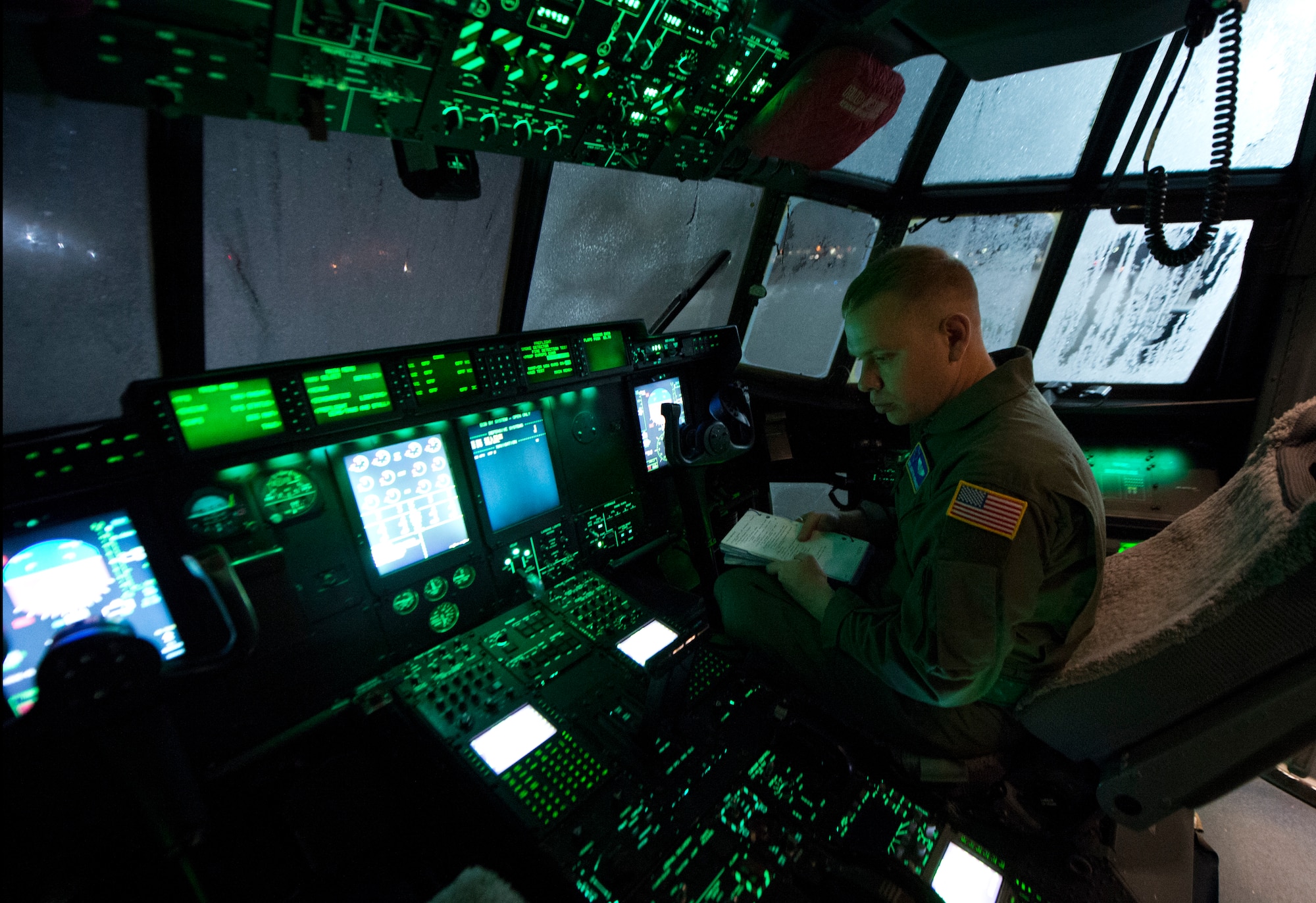 Staff Sgt. Jonathan Hernandez, 37th Airlift Squadron loadmaster, runs through preflight checks inside a C-130J Super Hercules March 6, 2014, Ramstein Air Base, Germany. Loadmasters play a critical role in ensuring the safety of passengers and aircrew before and during a flight. (U.S. Air Force photo/Airman 1st Class Jordan Castelan)