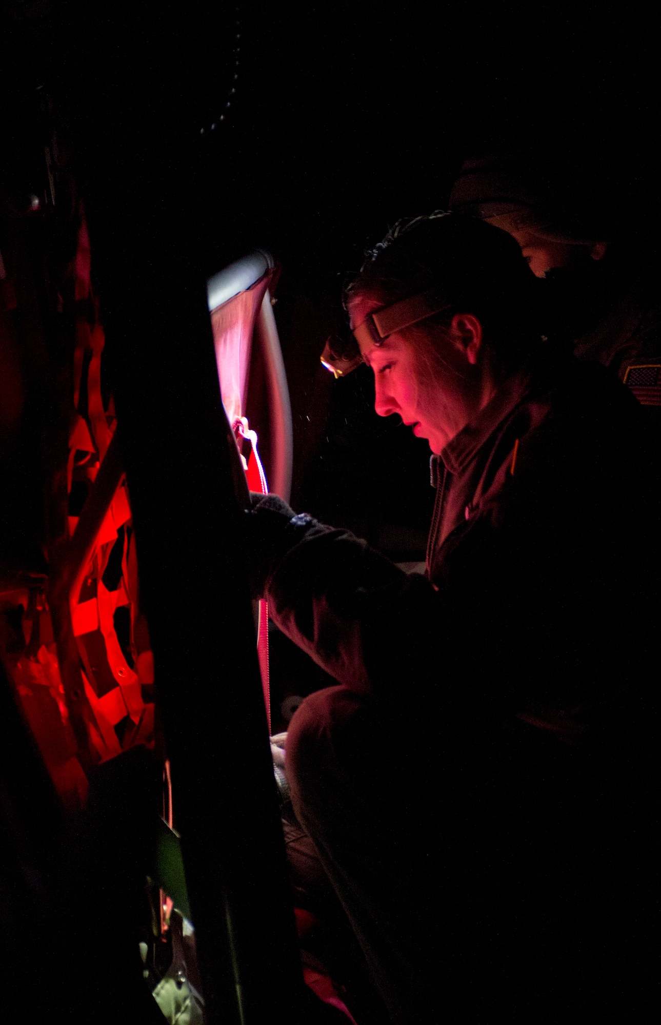 Staff Sgt. Brittany Wheat, 86th Aeromedical Evacuation Squadron aeromedical evacuation technician, prepares seating inside a C-130J Super Hercules during a training opportunity that measured the crew’s capabilities to handle in-flight scenarios March 6, 2014, Ramstein Air Base, Germany. The 86th AES is responsible for providing aeromedical evacuation for U.S. troops throughout U.S. Air Forces in Europe and Air Forces Africa’s area of responsibility. (U.S. Air Force photo/Airman 1st Class Jordan Castelan)