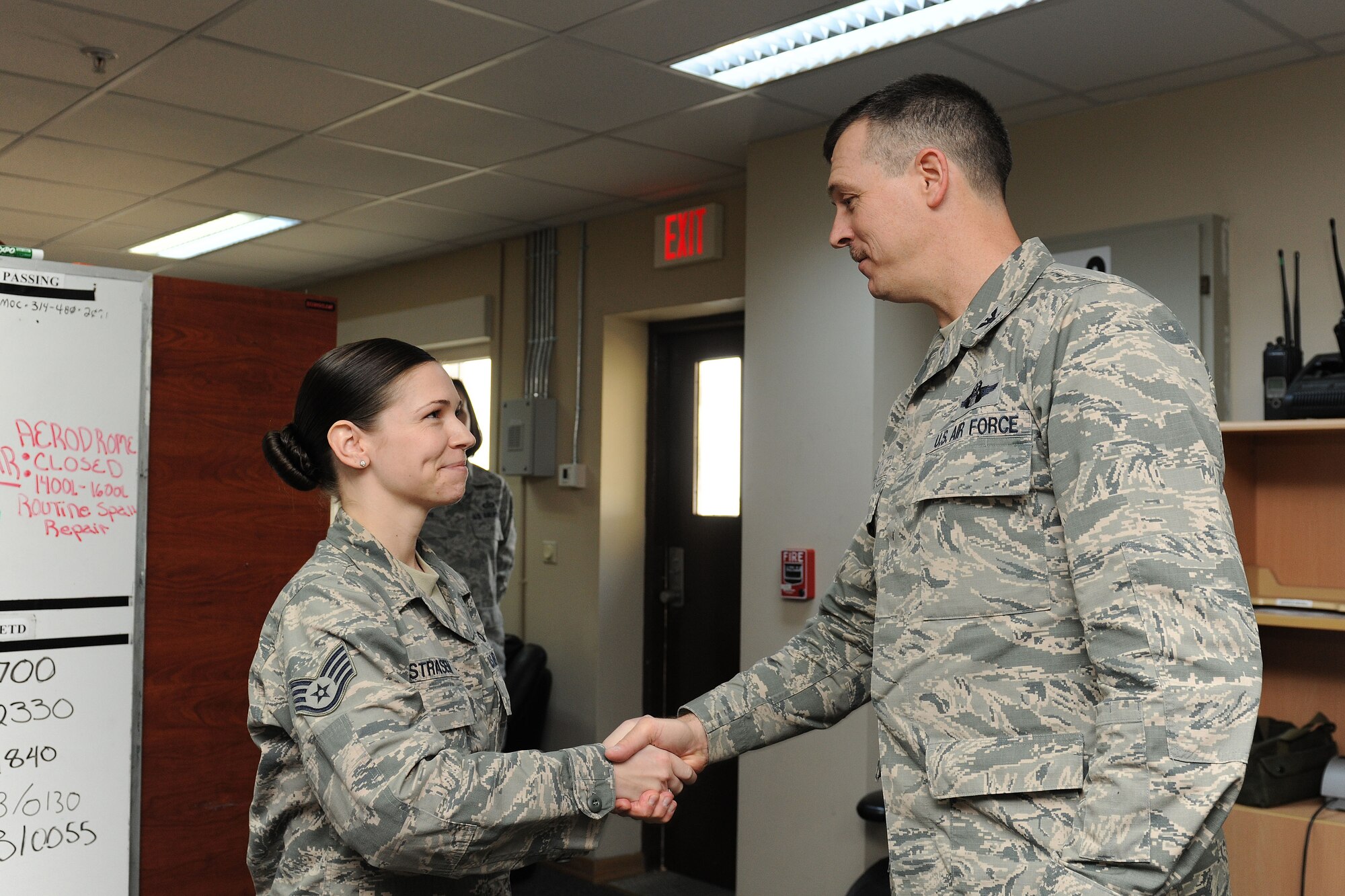 Staff Sgt Sarah Strasen, 39th Operations Squadron airfield management NCO in charge, is awarded the "Pick of the 'Lik" for the week of Mar. 12, 2014, at Incirlik Air Base, Turkey. 39th Air Base Wing leadership recognizes Airmen for demonstrating outstanding leadership and job performance abilities. (U.S. Air Force photo by Senior Airman Nicole Sikorski/Released)