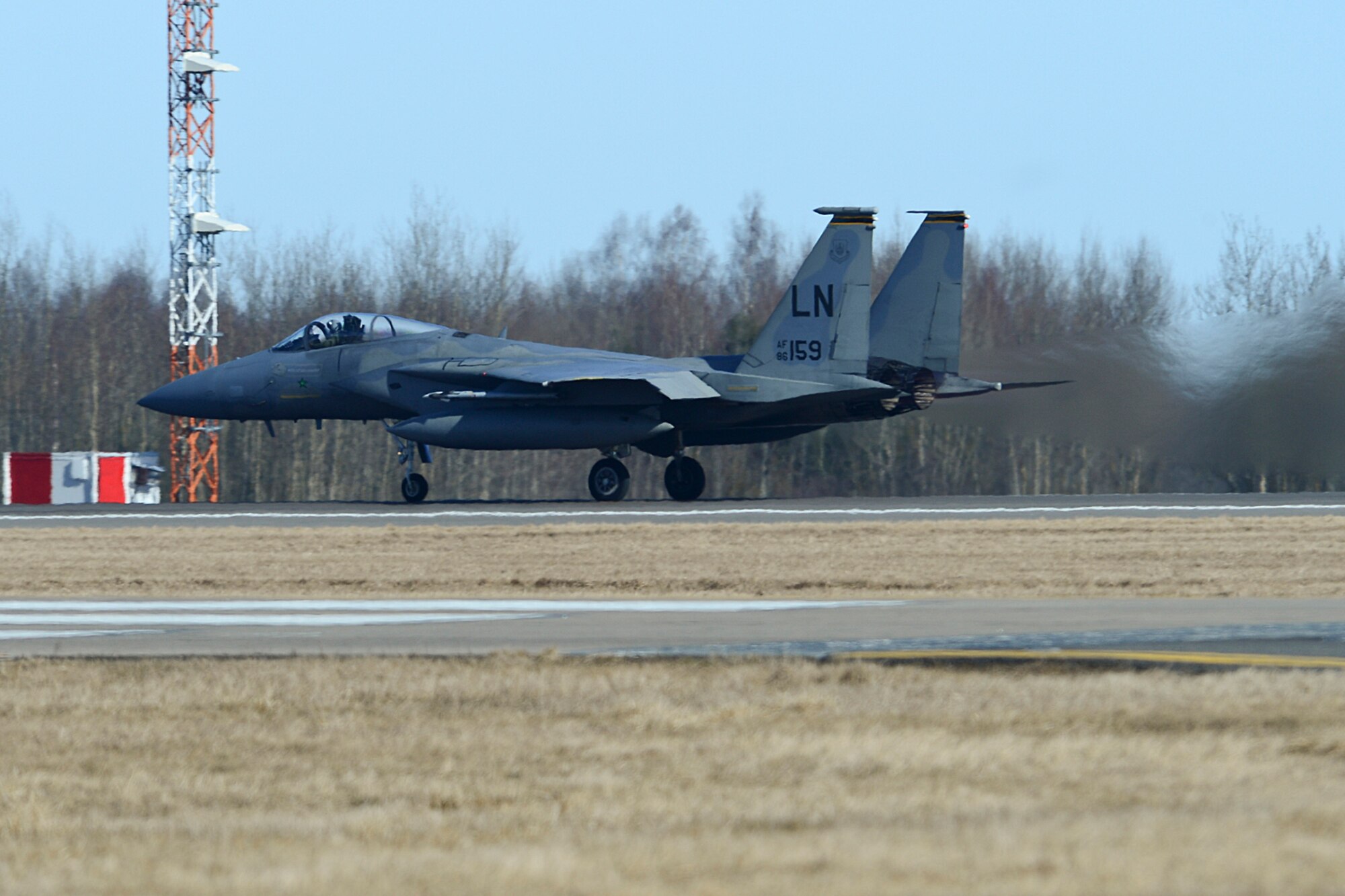 An F-15C Eagle takes off from Siauliai Air Base, Lithuania, during a training scramble mission Mar. 11, 2014. The 48th Fighter Wing at Royal Air Force Lakenheath, England, sent an additional six aircraft and more than 50 personnel, to augment the four aircraft and approximately 150 Airmen already supporting NATO's ongoing air policing mission, at the request of U.S. allies in the Baltics. (U.S. Air Force photo by Airman 1st Dana J. Butler)