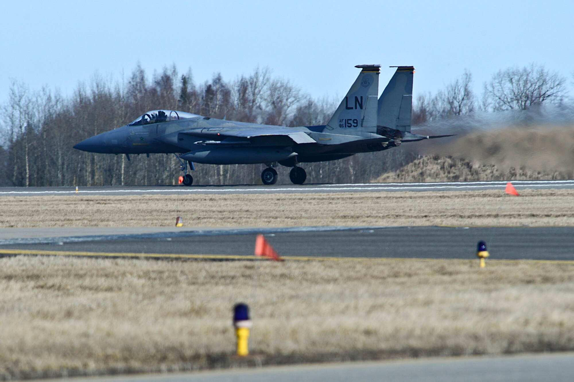 An F-15C Eagle takes off from Siauliai Air Base, Lithuania, during a training scramble mission Mar. 11, 2014. The 48th Fighter Wing at Royal Air Force Lakenheath, England, sent an additional six aircraft and more than 50 personnel, to augment the four aircraft and approximately 150 Airmen already supporting NATO's ongoing air policing mission, at the request of U.S. allies in the Baltics. (U.S. Air Force photo by Airman 1st Dana J. Butler)