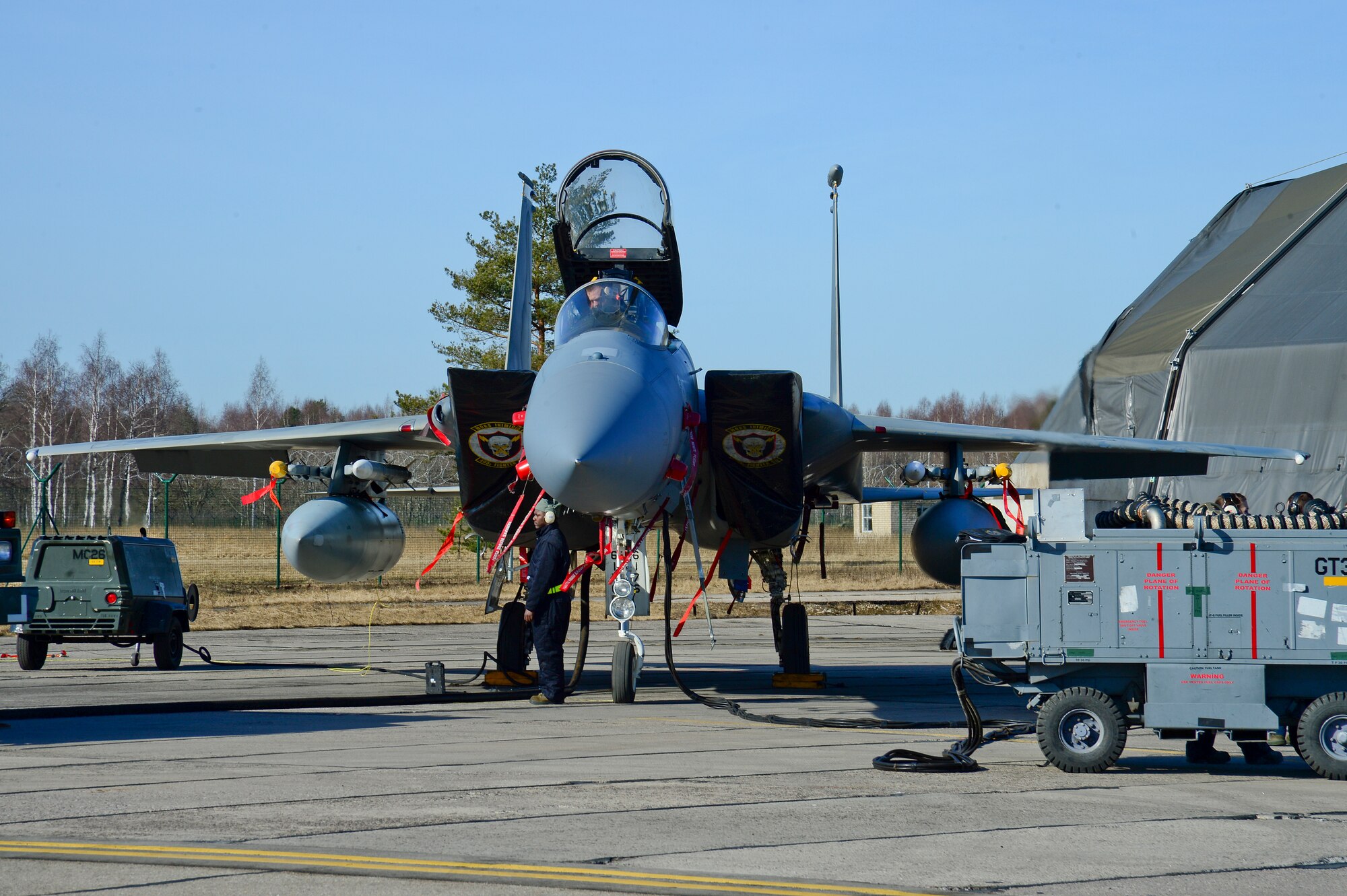 An F-15C Eagle receives fuel at Šiauliai Air Base, Lithuania March 11, 2014. The 48th Fighter Wing at Royal Air Force Lakenheath, England, sent an additional six aircraft and more than 50 personnel, to augment the four aircraft and approximately 150 Airmen already supporting NATO's ongoing air policing mission, at the request of U.S. allies in the Baltics. (U.S. Air Force photo by Airman 1st Dana J. Butler)
