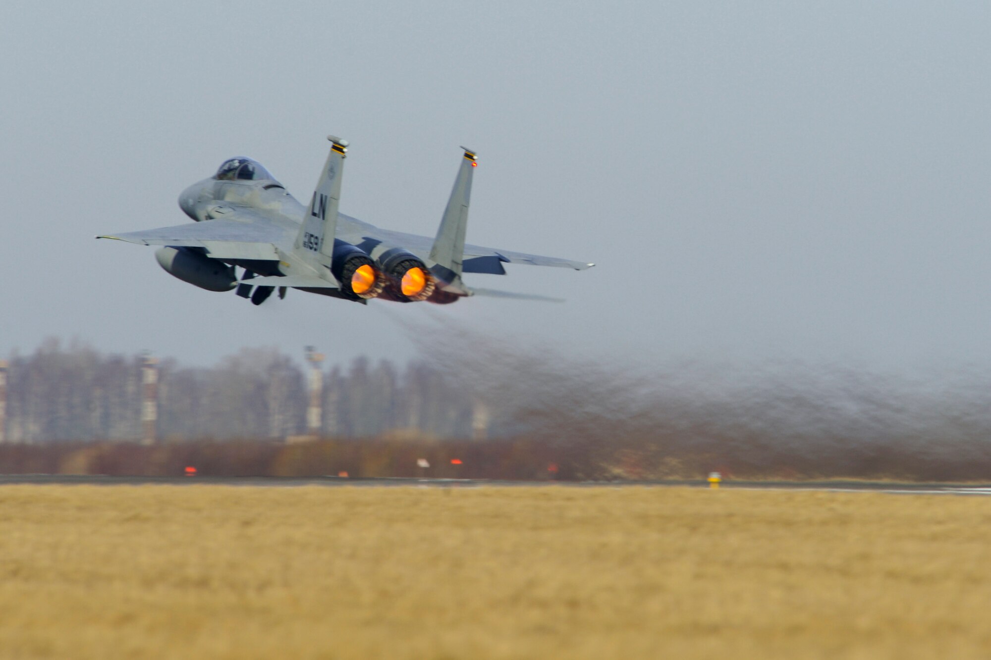 An F-15C Eagle takes off from Siauliai Air Base, Lithuania, during a training scramble mission Mar. 10, 2014. The 48th Fighter Wing at Royal Air Force Lakenheath, England, sent an additional six aircraft and more than 50 personnel, to augment the four aircraft and approximately 150 Airmen already supporting NATO's ongoing air policing mission, at the request of U.S. allies in the Baltics. (U.S. Air Force photo by Airman 1st Dana J. Butler)