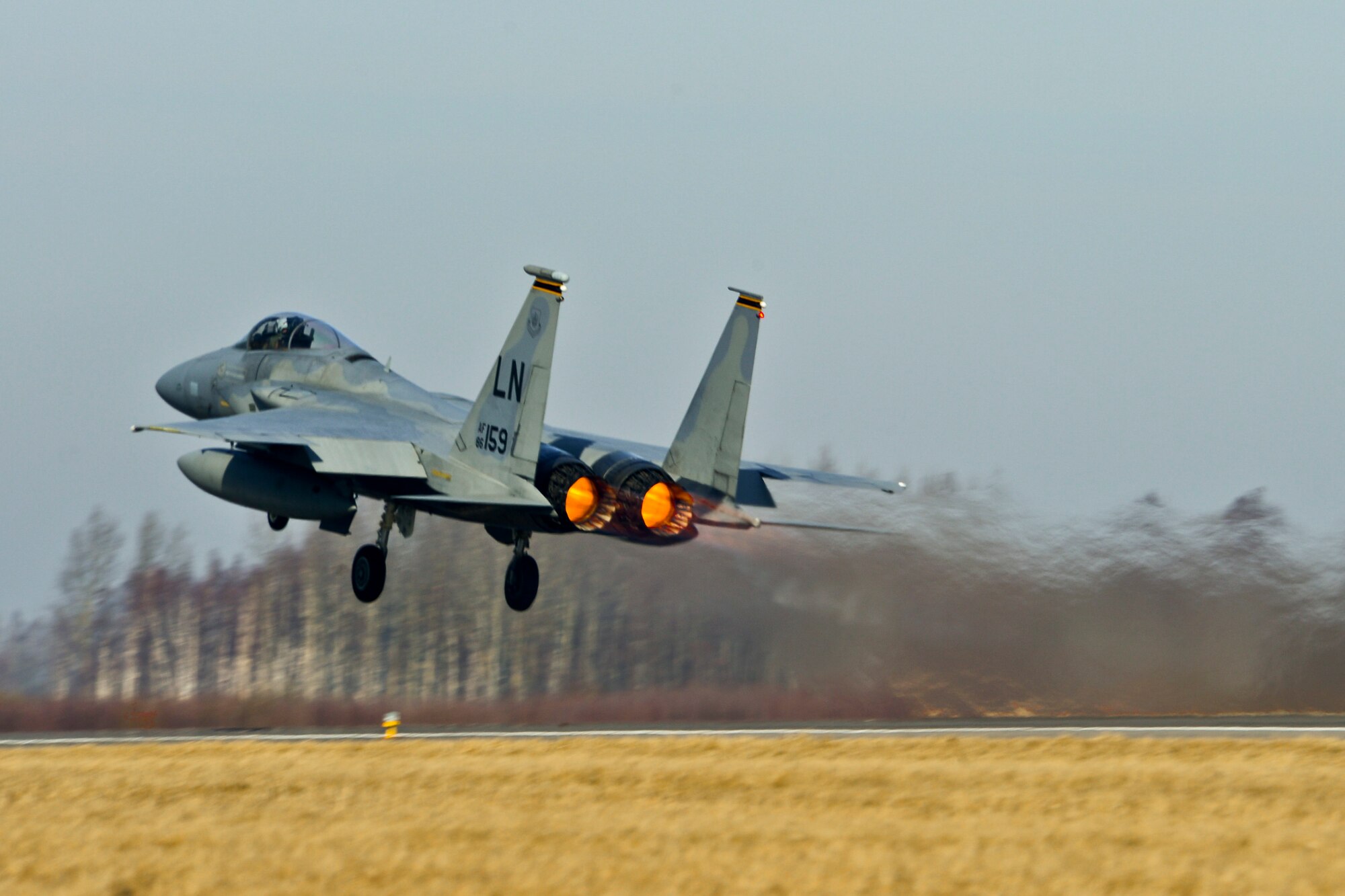 An F-15C Eagle takes off from Siauliai Air Base, Lithuania, during a training scramble mission Mar. 10, 2014. The 48th Fighter Wing at Royal Air Force Lakenheath, England, sent an additional six aircraft and more than 50 personnel, to augment the four aircraft and approximately 150 Airmen already supporting NATO's ongoing air policing mission, at the request of U.S. allies in the Baltics. (U.S. Air Force photo by Airman 1st Dana J. Butler)