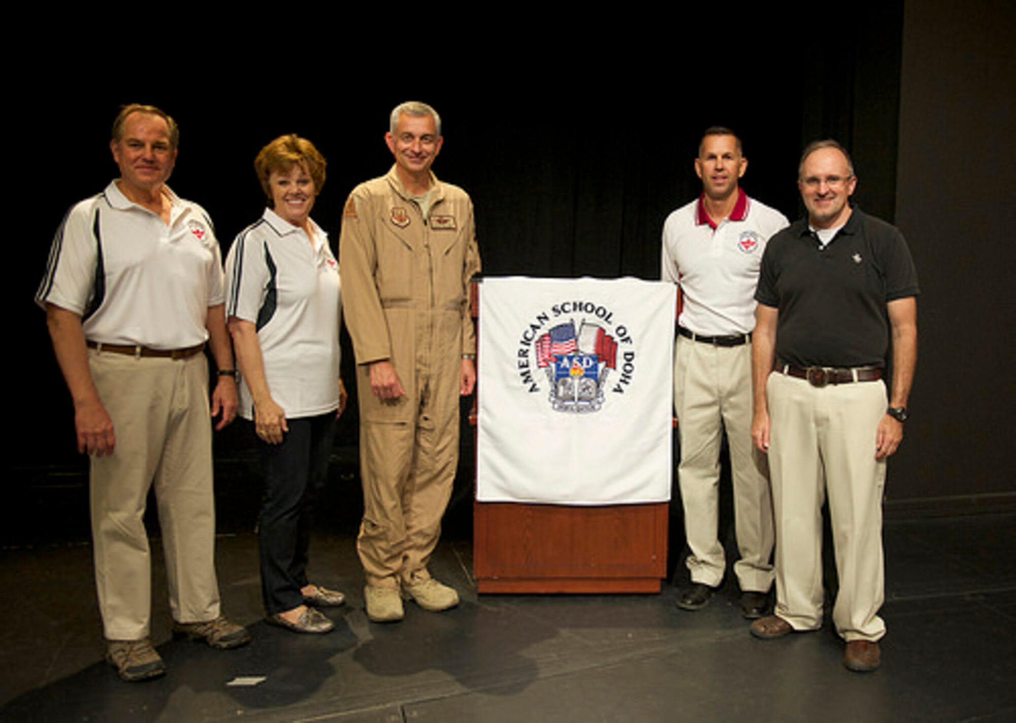 The American School of Doha hosted service members from Al Udeid Air Base and Camp As Sayliyah for Military Appreciation Day on Feb. 7, 2014.  The day’s festivities afforded Airmen, Soldiers, Sailors and Marines the opportunity to use all the school’s athletic facilities and participate in a variety of sports.  Key speakers thanking the military for its continued support to the local community were Dr. Phillip Stroup, ASD director of development and External Relations; Dr. Deborah Welch, director of American School of Doha; Brig Gen. Roger Watkins, 379th Air Expeditionary Wing commander; Col. William Wozniak, Area Support Group commander; and Mr. Ian McCary, deputy chief of Mission, U.S. Embassy-Doha.  (Photograph by Alfred Tripolone III, Area Support Group, Camp As Sayliyah, Qatar)