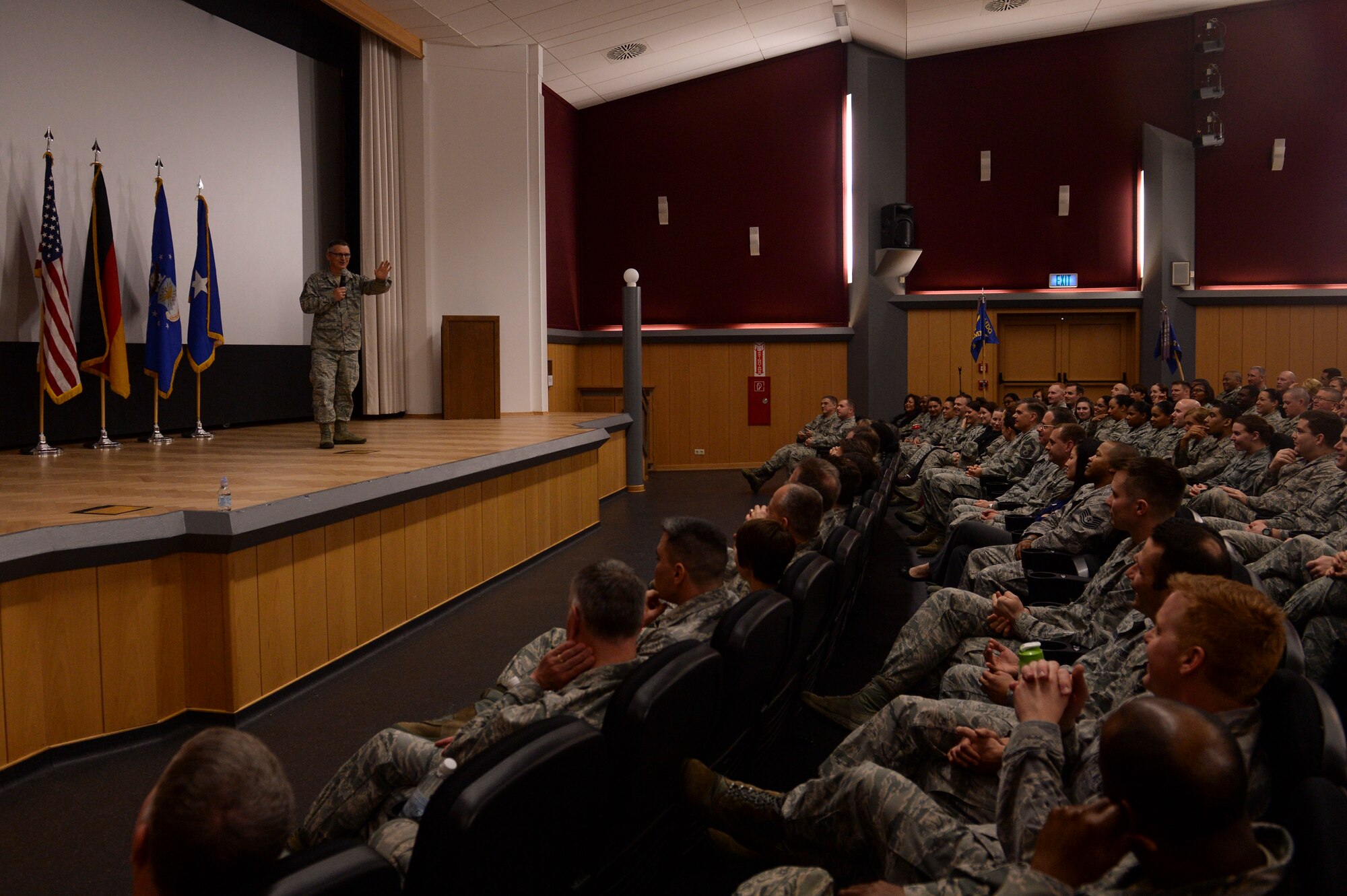 U.S. Air Force Chief Master Sgt. Kevin Lambing, Chief of Medical Enlisted Force and Enlisted Corps Chief, office of the surgeon general, speaks during an all call March 12, 2014, at Spangdahlem Air Base, Germany. Lt. Gen. Thomas Travis, U.S. Air Force Surgeon General, and the chief talked with Spangdahlem medical Airmen about current Air Force issues. (U.S. Air Force photo by Senior Airman Rusty Frank/Released)
