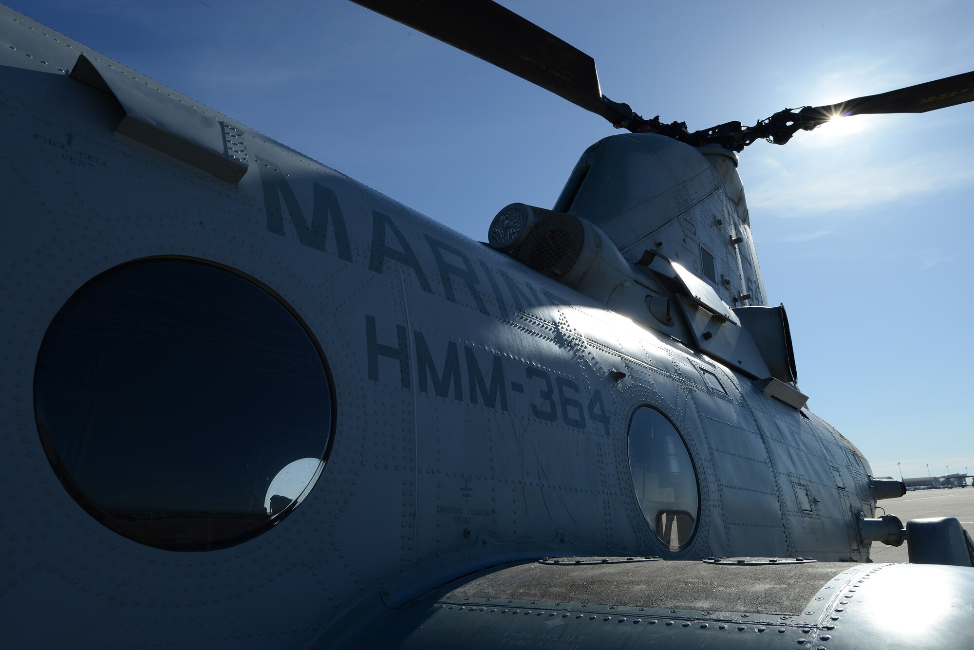 A CH-46 Sea Knight helicopter is prepped for a flight March 13, 2014, at Mountain Home Air Force Base, Idaho. Marines from the 3rd Marine Aircraft Wing at Marine Corps Air Station Miramar, Calif., are currently at MHAFB participating in Gunfighter Flag. MHAFB is the host for this unique exercise, which features the U.S. Air Force, Marine Corps, Navy and British Army. The goal of this operation is to assimilate a joint force that can fly, fight and win. (U.S. Air Force photo by Senior Airman Benjamin Sutton/Released)