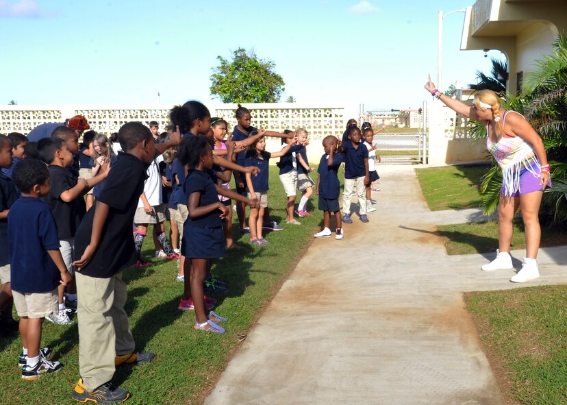 Children participate in a Zumba exercise class, Feb. 13, 2014, at the Child Development Center on Andersen Air Force Base, Guam. This is the first ever Zumba event the center has held and the CDC plans to host Zumba every quarter. (U.S. Air Force photo by Senior Airman Cierra Presentado/Released)