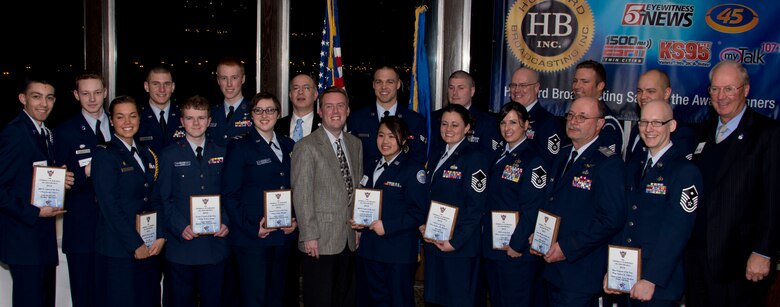 Retired U.S. Air Force Gen. Craig McKinley, President of the Air Force Association, upper right, pose for a group photograph in St. Paul, Minn., Mar. 15, 2014. The Air Force Association recognized men and women for their outstanding accomplishments. 
(U.S. Air National Guard photo by Tech. Sgt. Amy M. Lovgren/Released)


