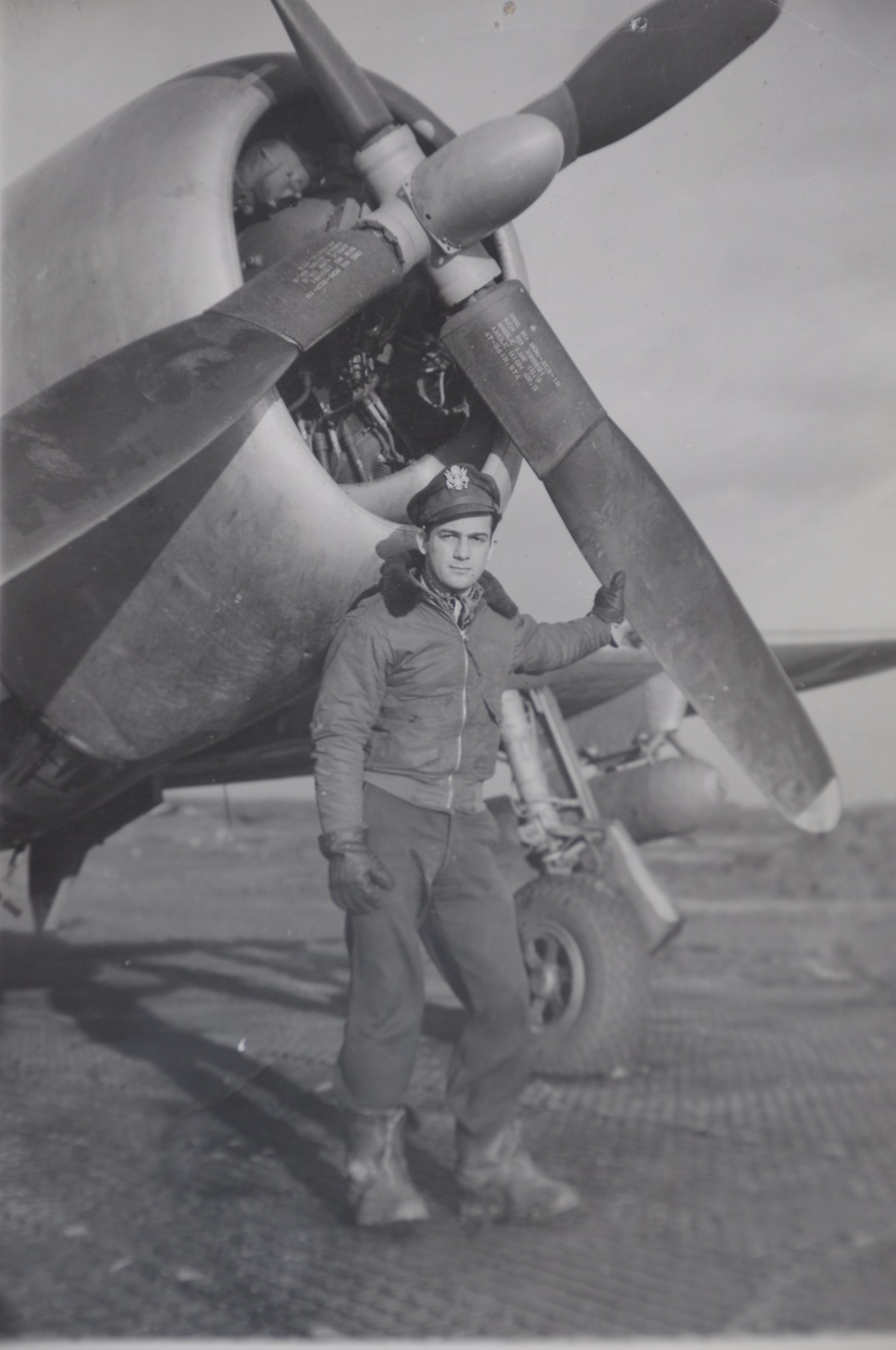 Then 1st Lt. Kenneth Sadick, World War II P-47 Thunderbolt pilot, poses in front of his P-47 Thunderbolt in the November of 1947 in St. Tronde, Belgium, just a month before flying in the Battle of the Bulge. (Courtesy photo) 