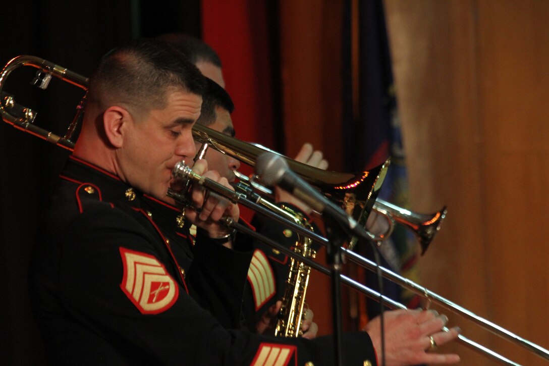 FLORAL PARK, N.Y. - Staff Sgt. Ken Ebo, trombone instructor at the Armed Forces School of Music in Virginia Beach, Va., performs with the Marine Corps Jazz Ensemble on March 7 at Floral Park High School.  Ebo, from Aiken, S.C., along with five other Marine musicians recently finished touring the 1st Marine Corps District’s area of operations to spread knowledge of the Marine Corps’ Musician Enlistment Option Program.  (U.S. Marine Corps photo by Lance Cpl. Brandon Thomas).