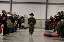 Sgt. Britni M. Garcia Green, a Platoon 4017, Company N, 4th Recruit Training Battaltion, Marine Corps Recruit Depot Parris Island drill instructor, shouts the command "eyeballs"  during Recruiting Station Kansas City's all-hands female pool function at Building 712 at 9th Marine Corps District Headquarters March 15, 2014. The command of eyeballs is used by drill instructors to instruct recruits to look at them as they are about to give instruction. Poolees from all the Recruiting Sub-Stations in the RS were on-hand for the event.