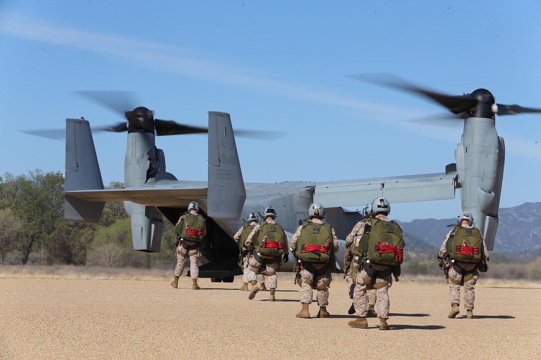 Marines with the Maritime Raid Force 11th Marine Expeditionary Unit, board an MV-22B Osprey for a training jump during Realistic Urban Training Marine Expeditionary Unit Exercise 14-1 (RUTMEUEX), Fort Hunter Liggett, Calif., March 16, 2014. RUTMEUEX will prepare the 11th MEU Marines for their upcoming deployment by enhancing their combat skills in environments similar to those they may find in future missions. (Photo by: U.S. Marine Corps Corporal Jonathan R. Waldman, 11th Marine Expeditionary Unit Combat Camera/Released)