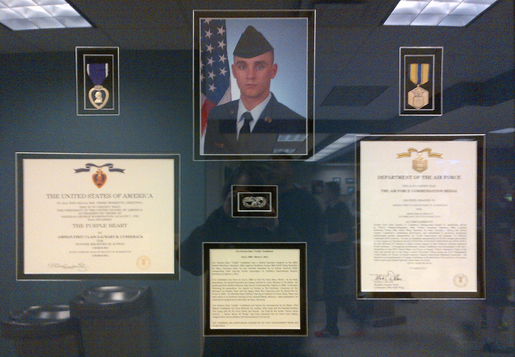 The Airman 1st Class Zachary Cuddeback Memorial Display is located at the passenger terminal at Scott Air Force Base, Ill. (U.S. Air Force photo)