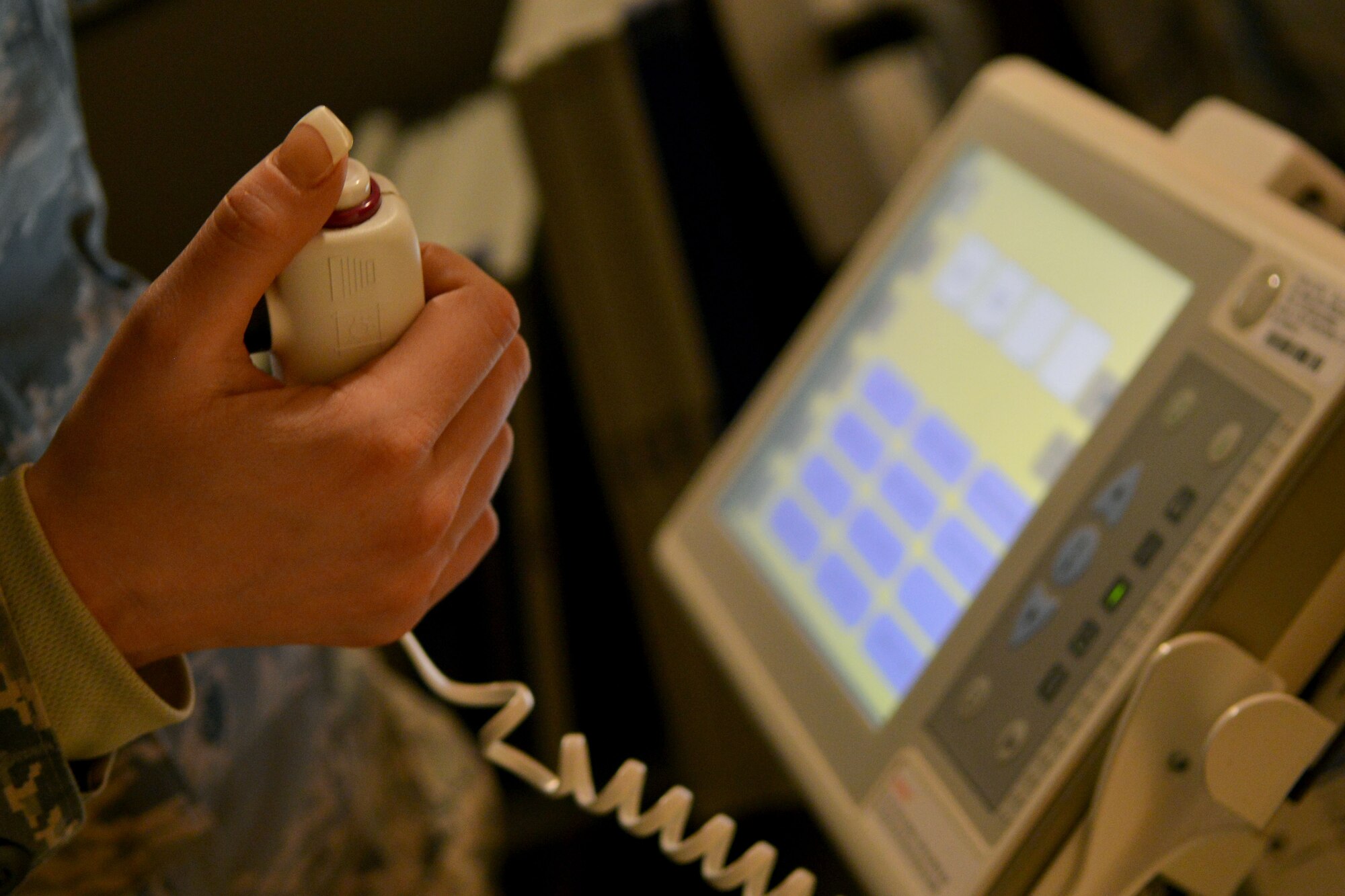U.S. Air Force Staff Sgt. Lauren Key, 20th Medical Support Squadron medical maintenance NCO in charge calibrates an X-ray machine, Shaw Air Force Base, S.C., March 13, 2014. The medical maintenance shop consists of five Airmen who repair all medical equipment. (U.S. Air Force photo by Senior Airman Ashley L. Gardner/Released) 