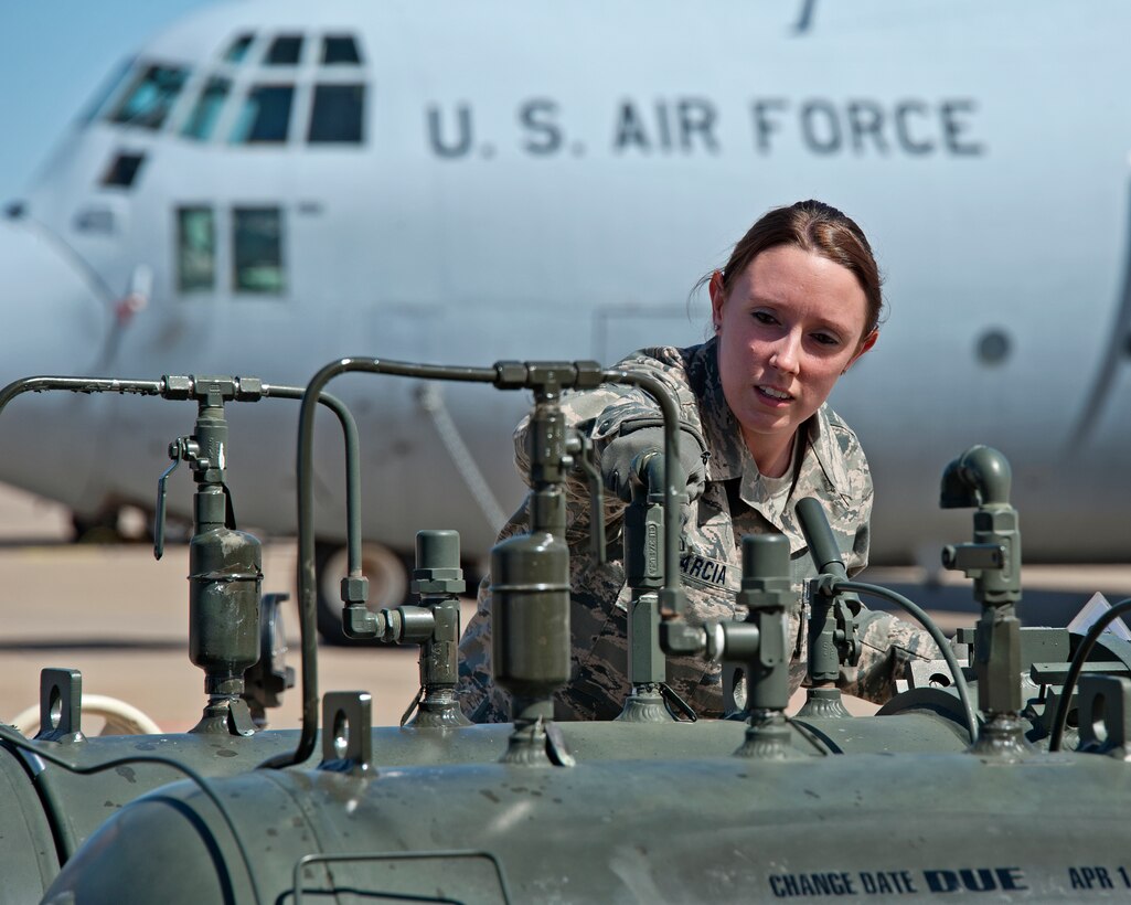 .S. Air Force Staff Sgt. Shelese Garcia, 364th Training Squadron, does a daily inspection on the R-19 Filter Separator that coalesces water and filters fine sediment out of the fuel during the Fuels Operational Readiness Capability Equipment (FORCE) course on March 13, 2014 at Sheppard Air Force Base, Texas. (U.S. Air Force photo by Frank Carter/Released)

