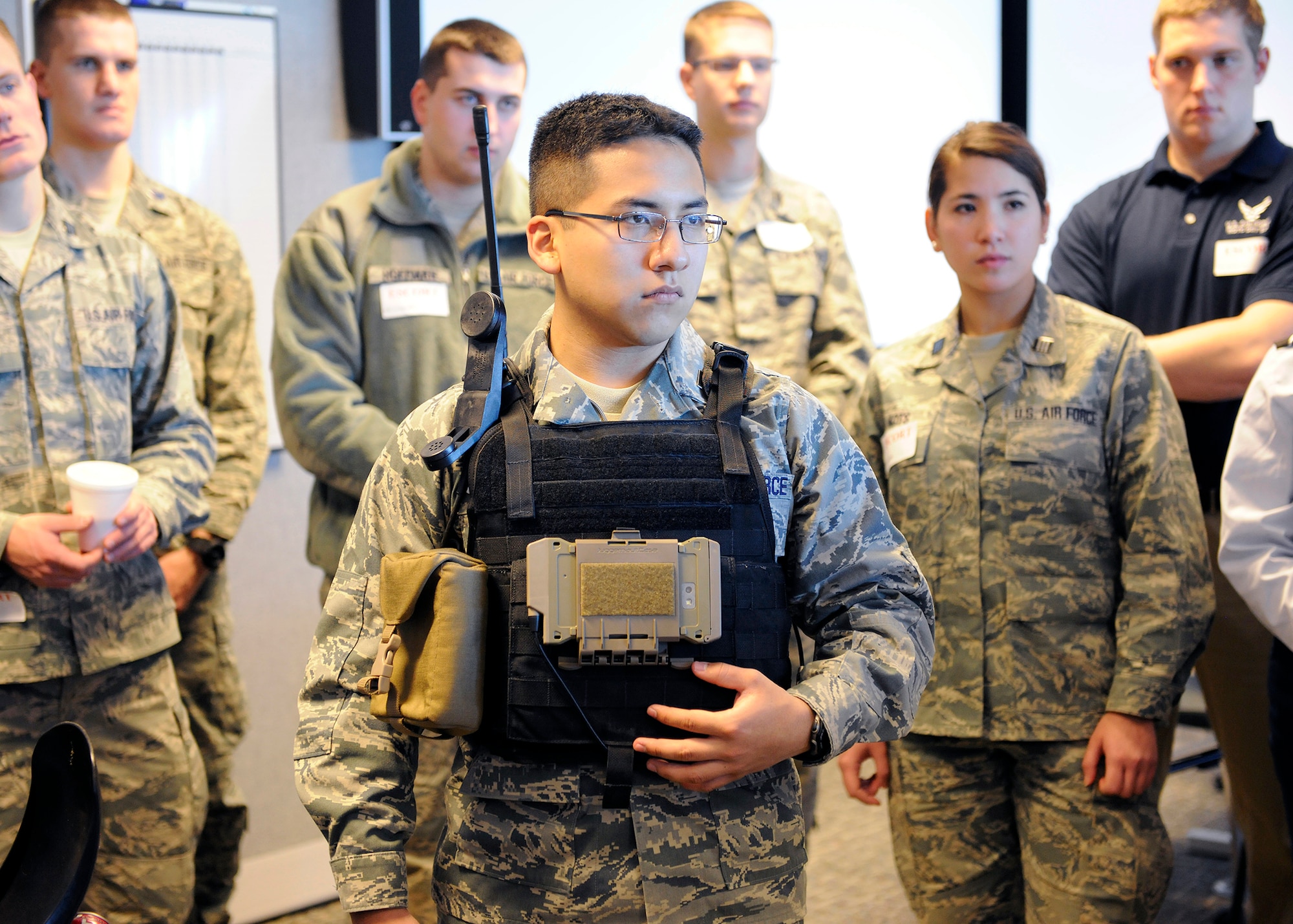 Cadets listen in during a cyber information briefing while visiting the Information Directorate.